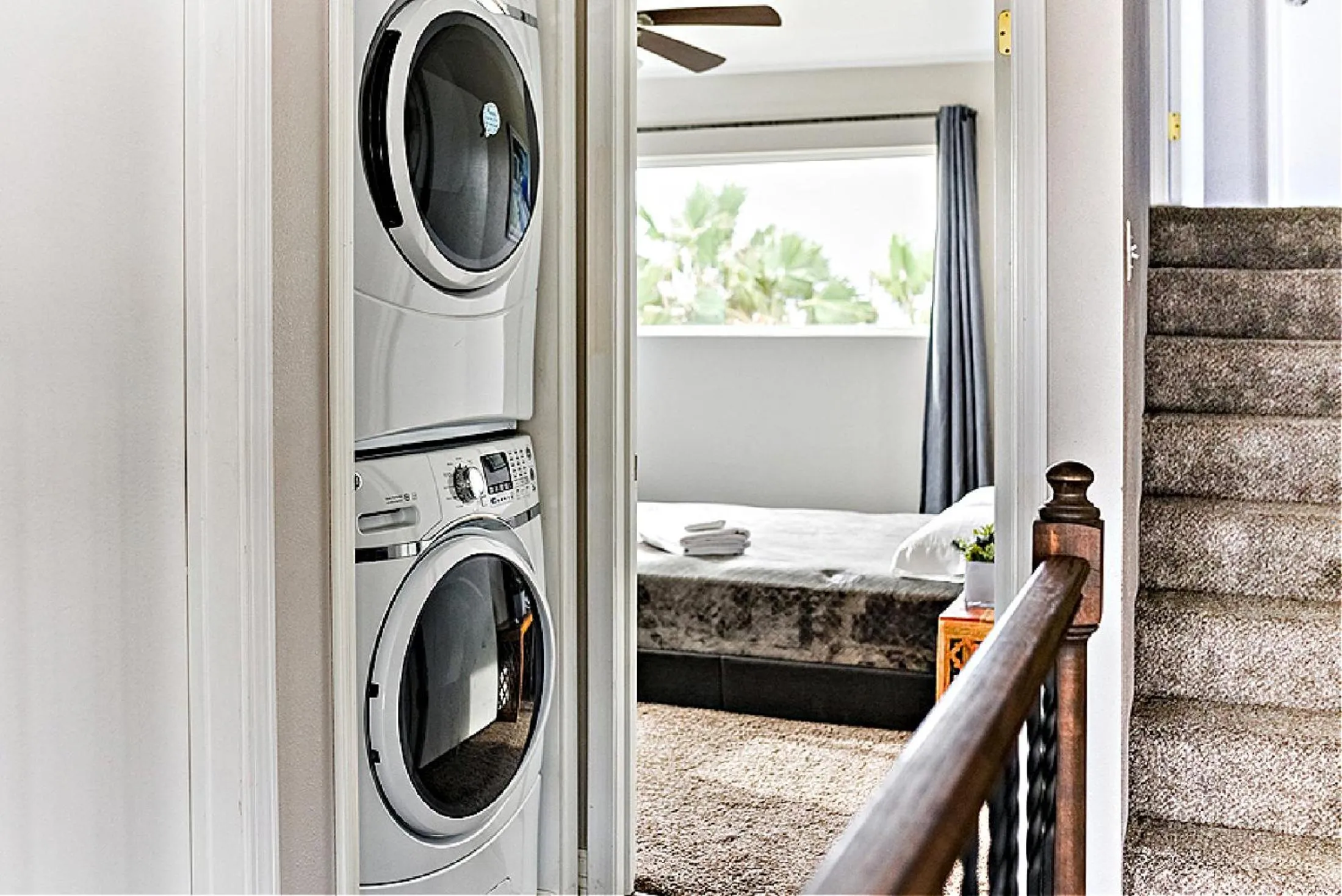 laundry in Bay Front Home with Spectacular Sunrise Views