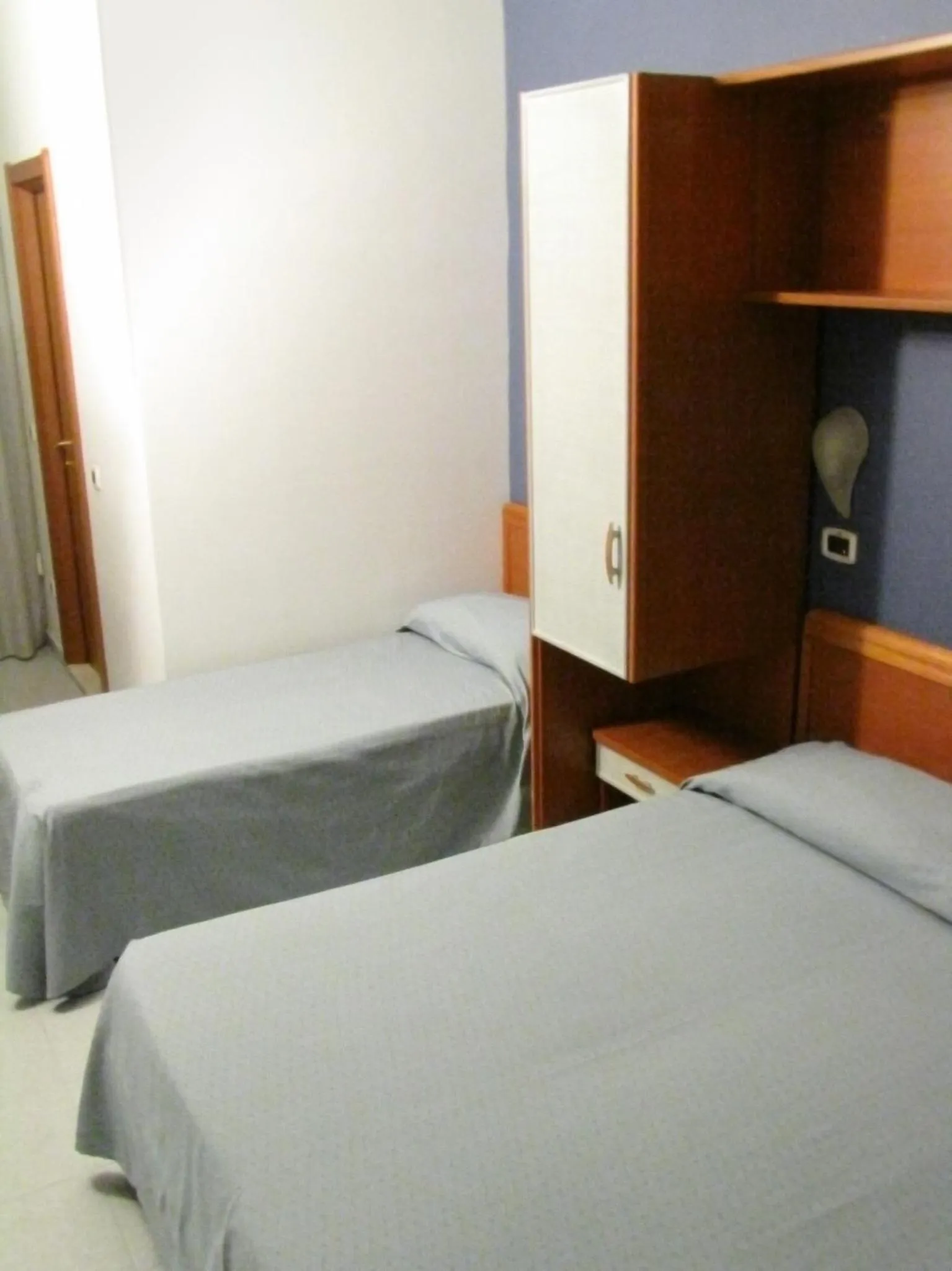 Bed in Hotel Acquario