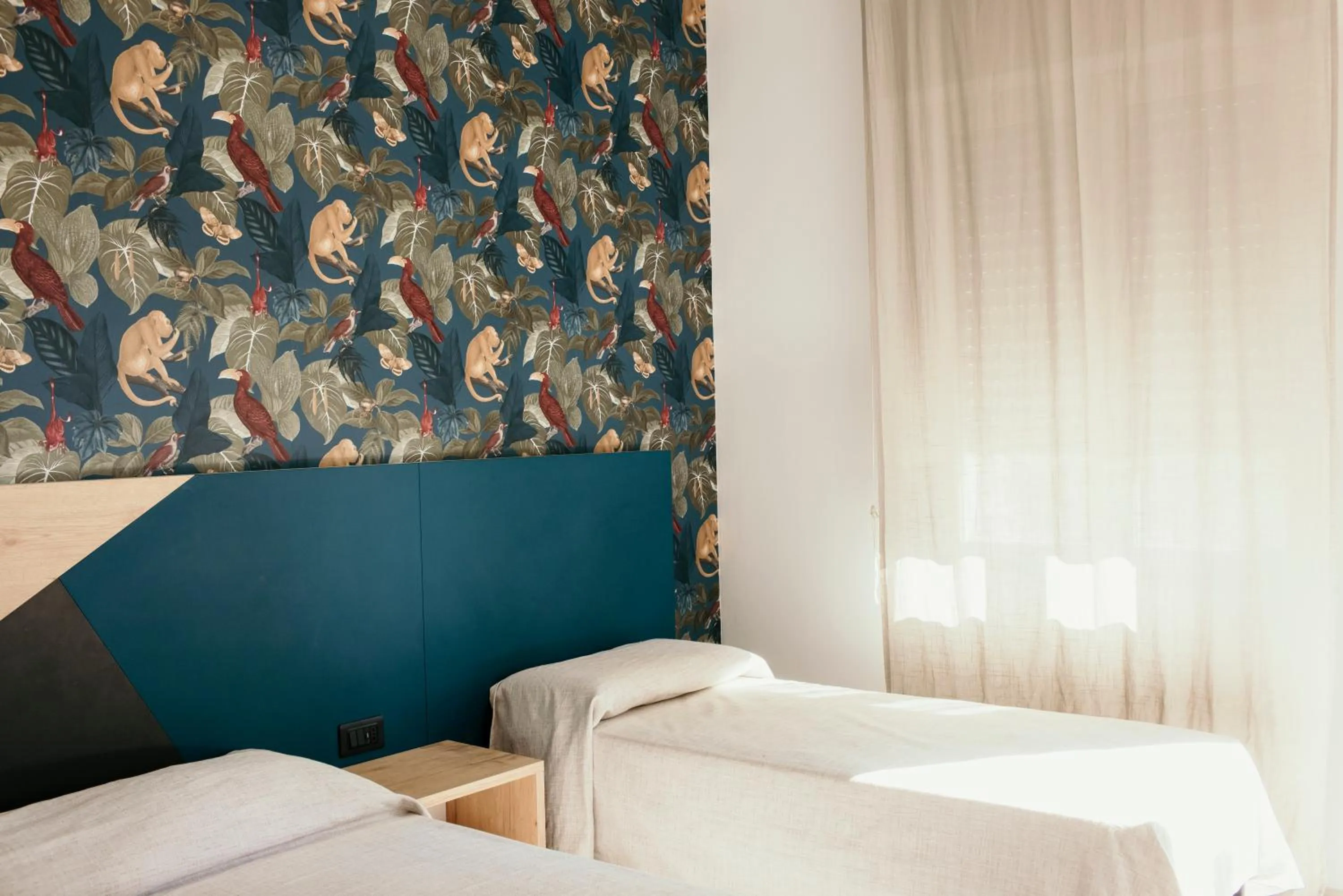 Bed in Hotel Acquario