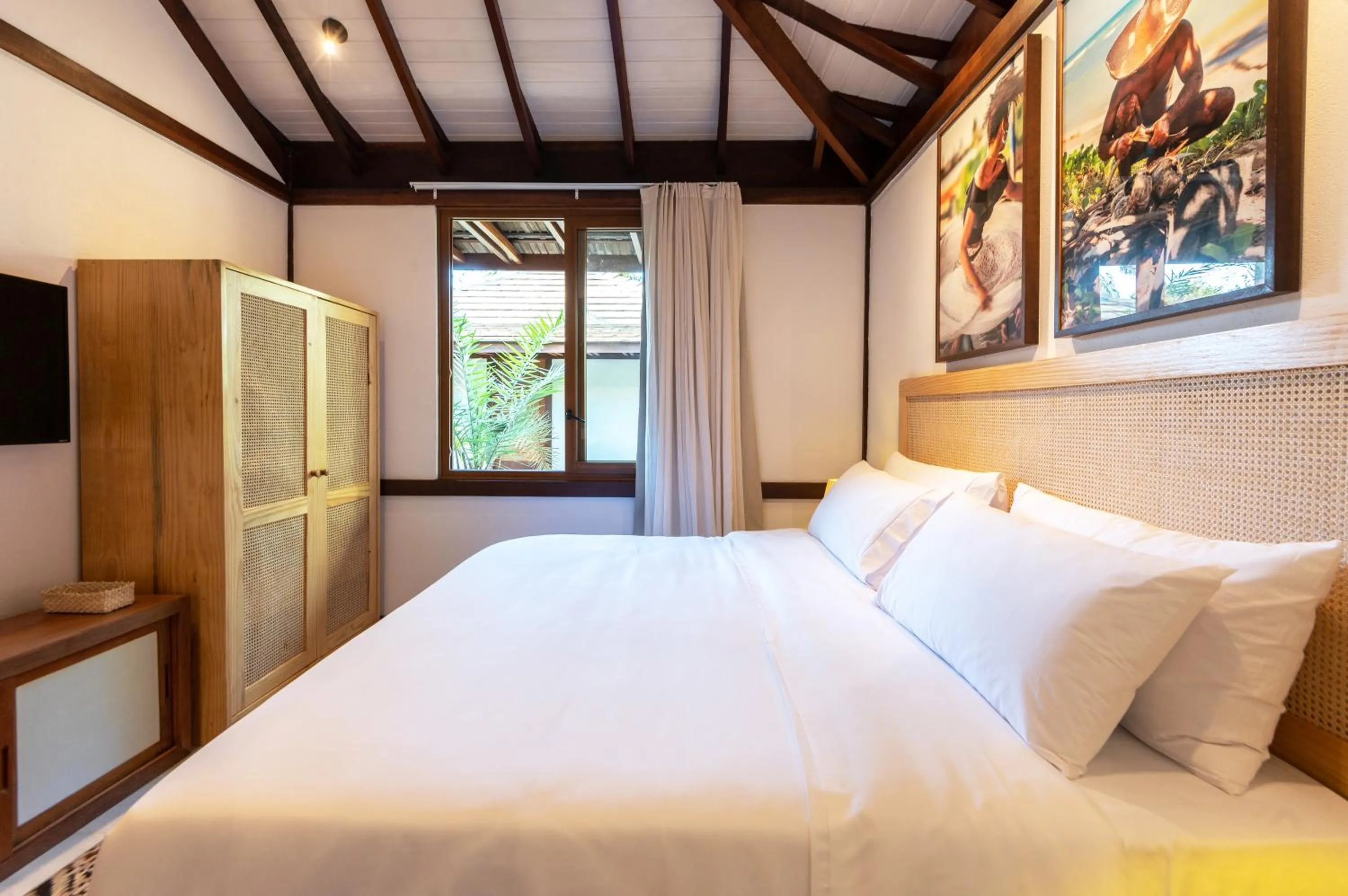 Bed in Colibri Beach Villas