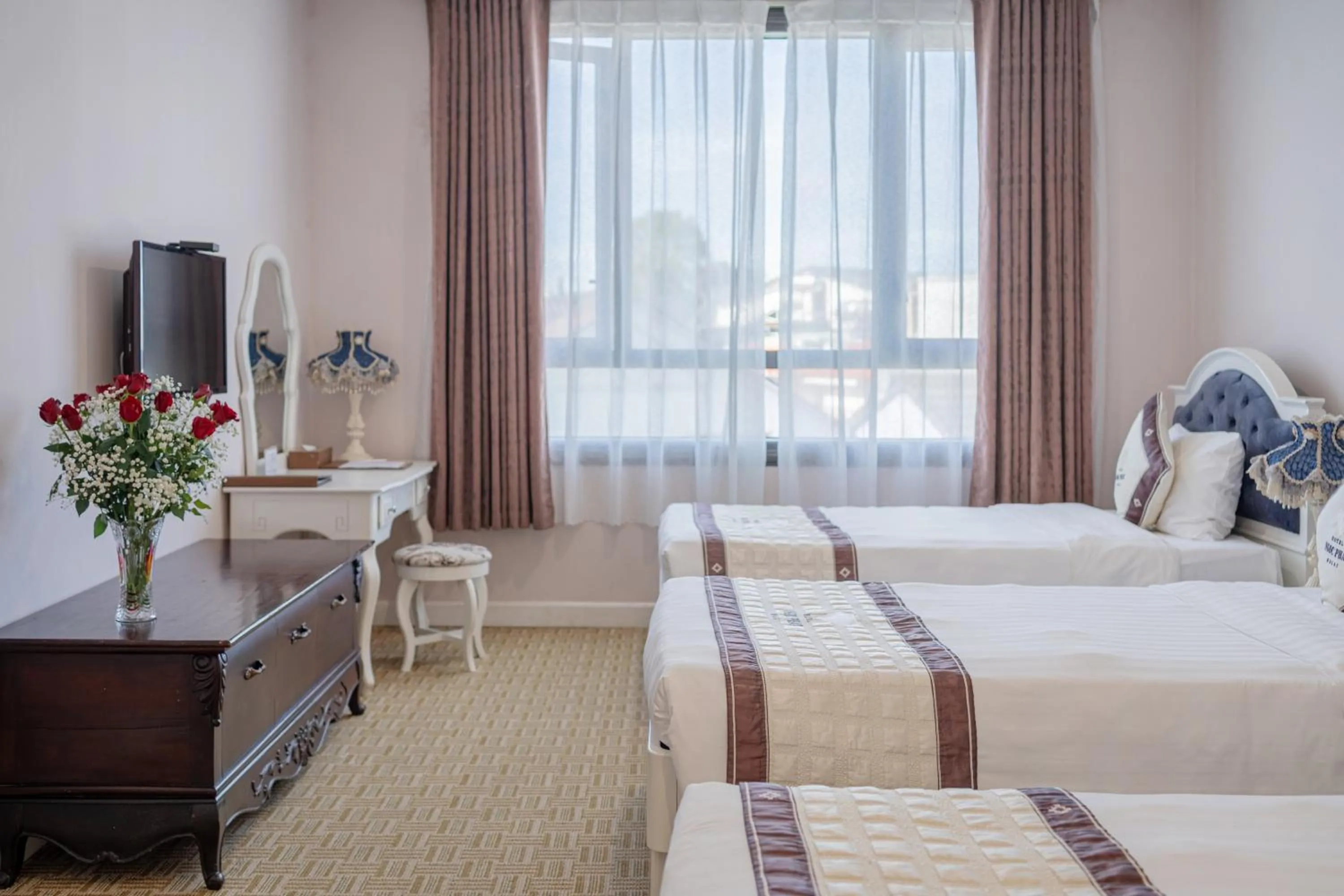 Bed in Ngoc Phat Dalat Hotel