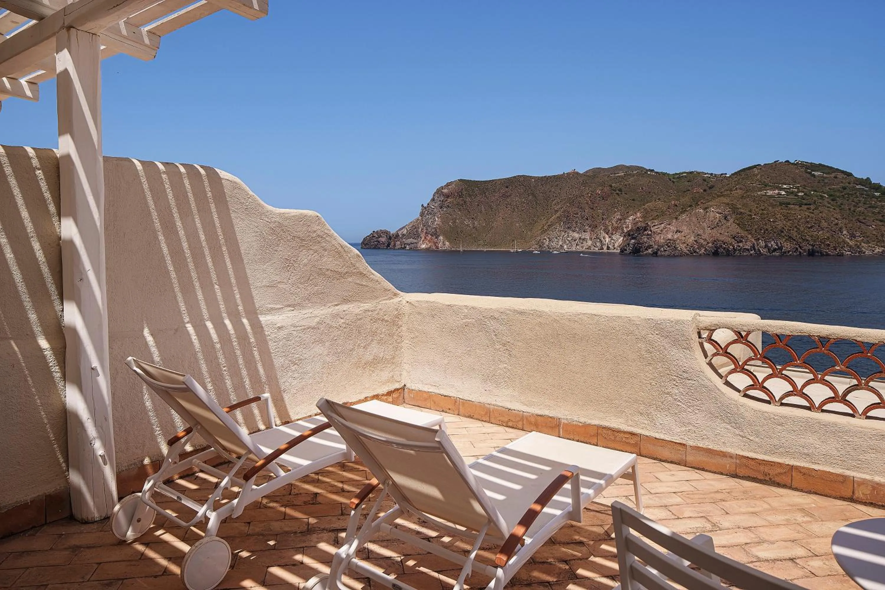 Balcony/Terrace in Therasia Resort Sea and SPA - The Leading Hotels of the World