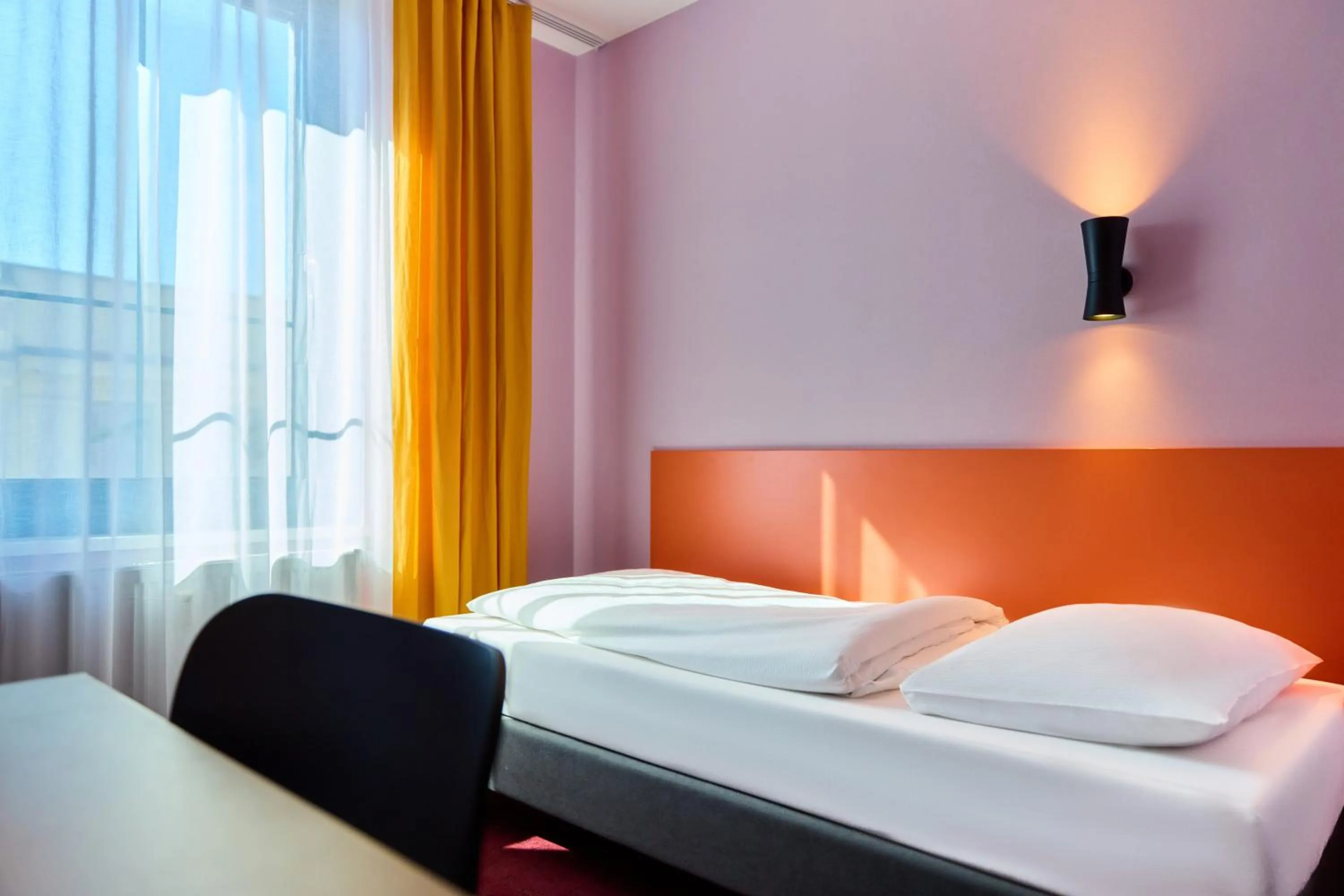 Bed in McDreams Hotel Leipzig