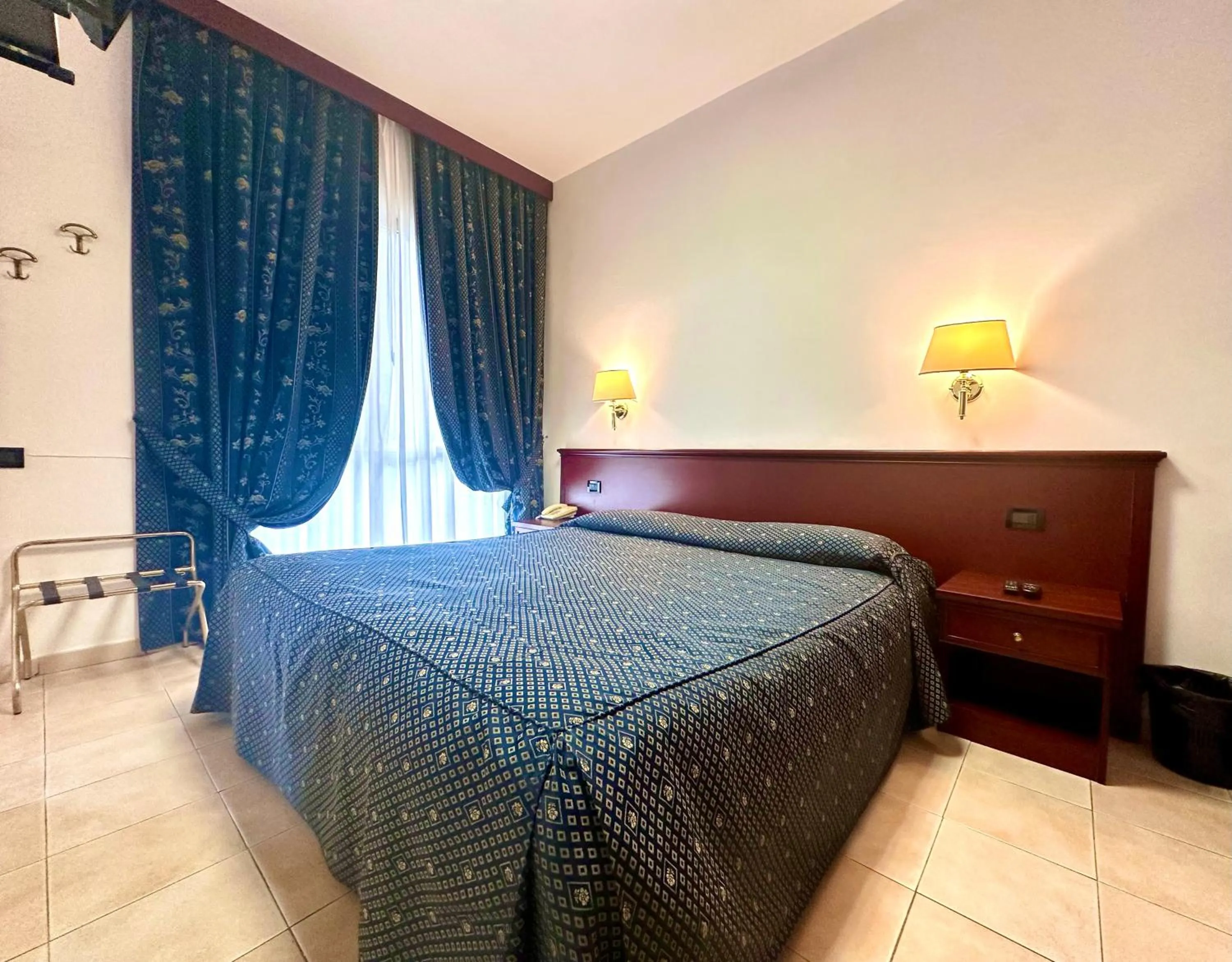 Bed in Hotel Leonardo