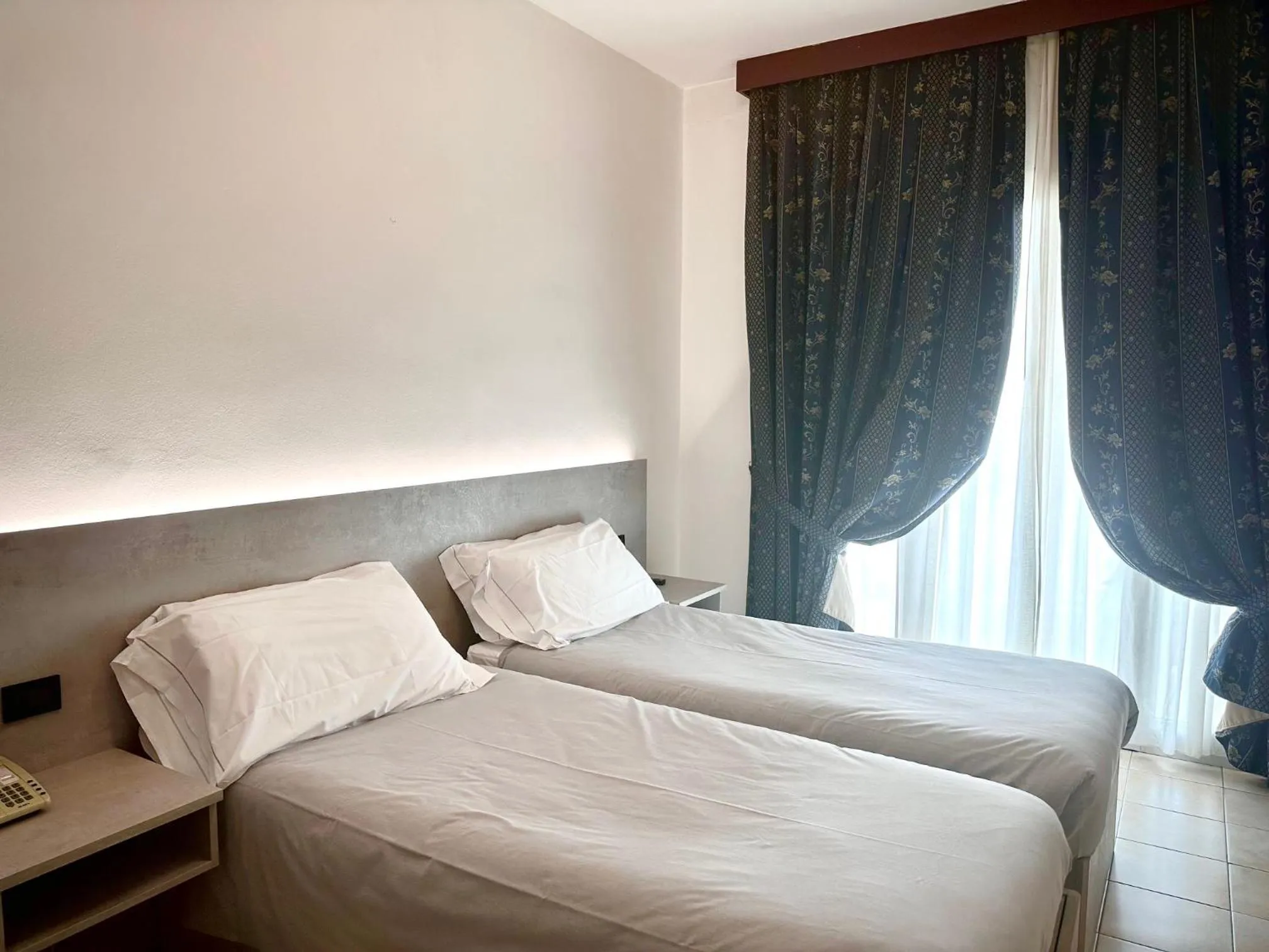 Bed in Hotel Leonardo