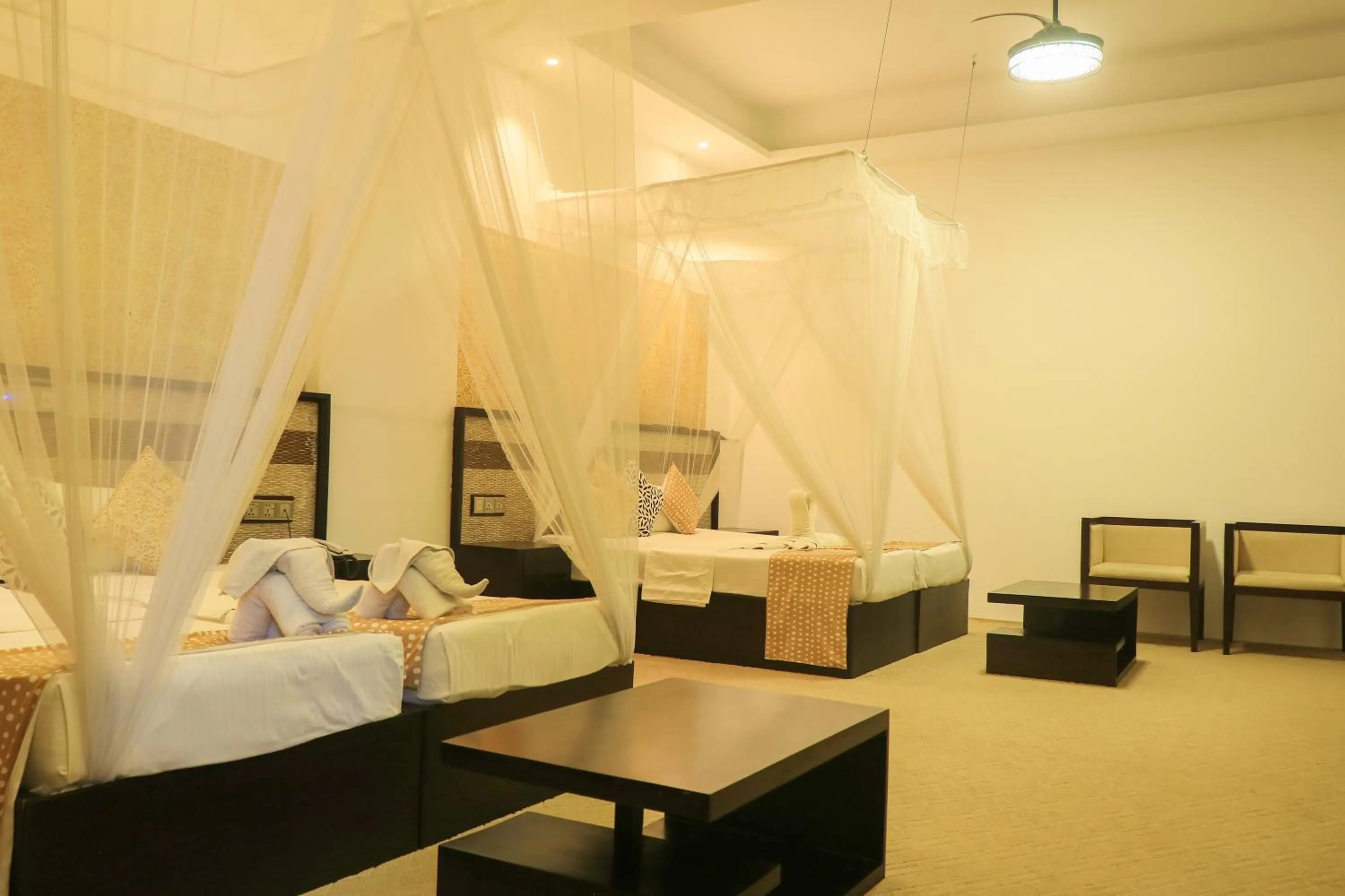 Bed in Thissa Inn Hotel