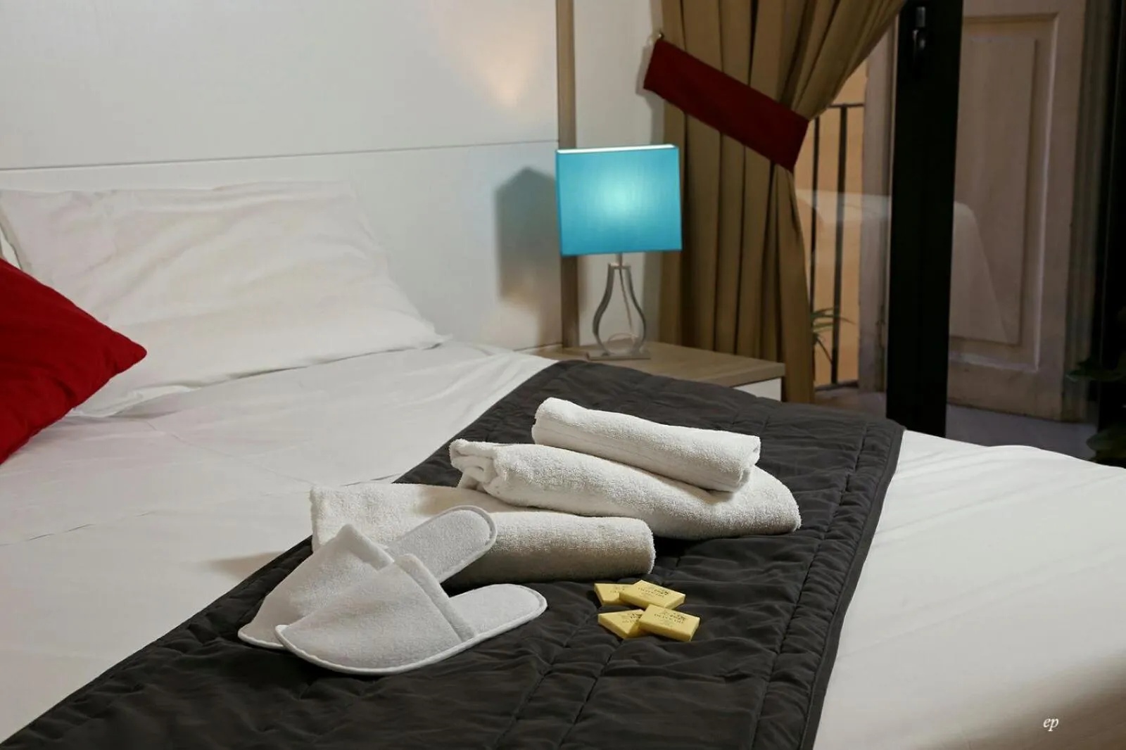 Bed in Caravaggio Hotel