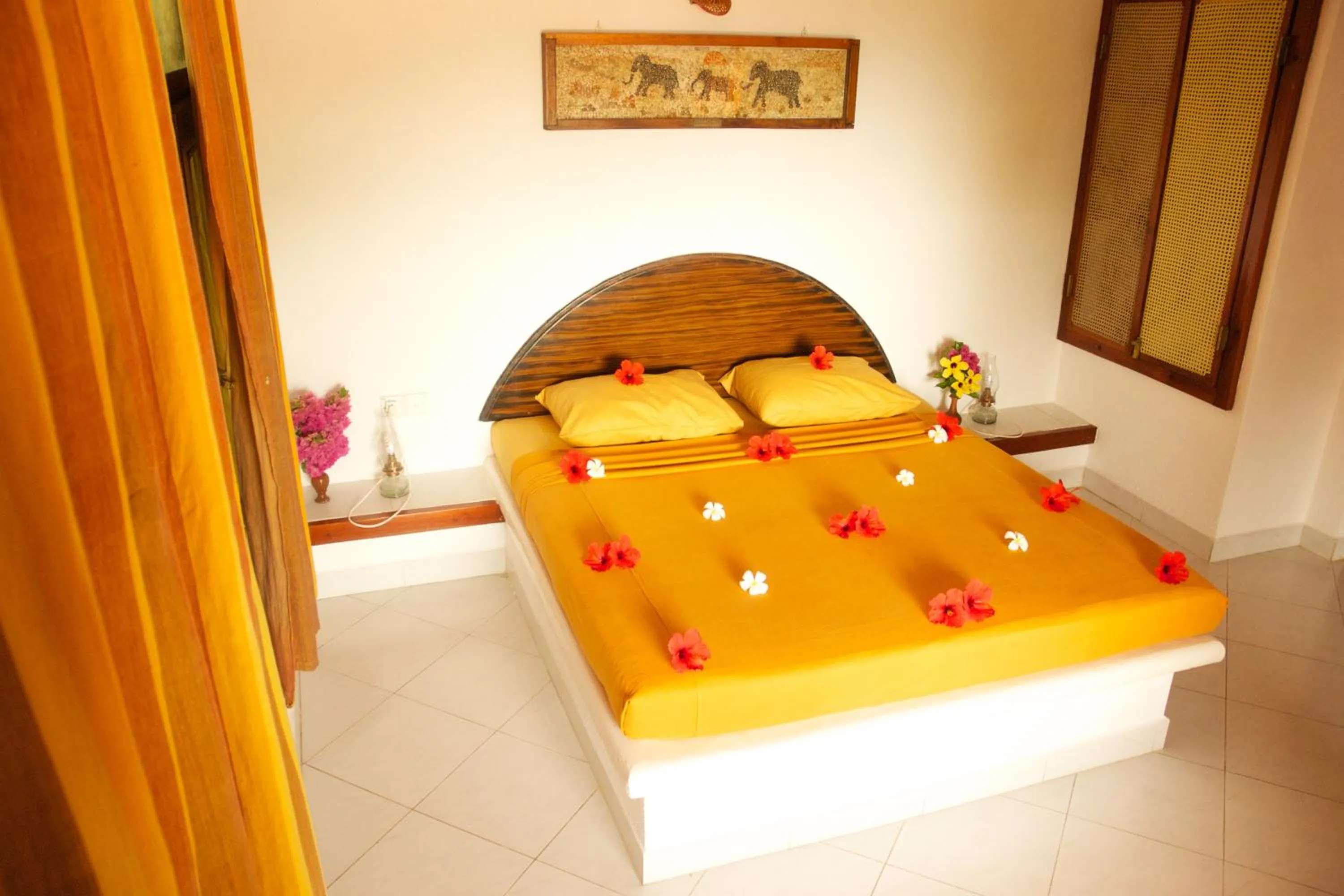 Bedroom, Bed in Eva Lanka Hotel - Beach & Wellness