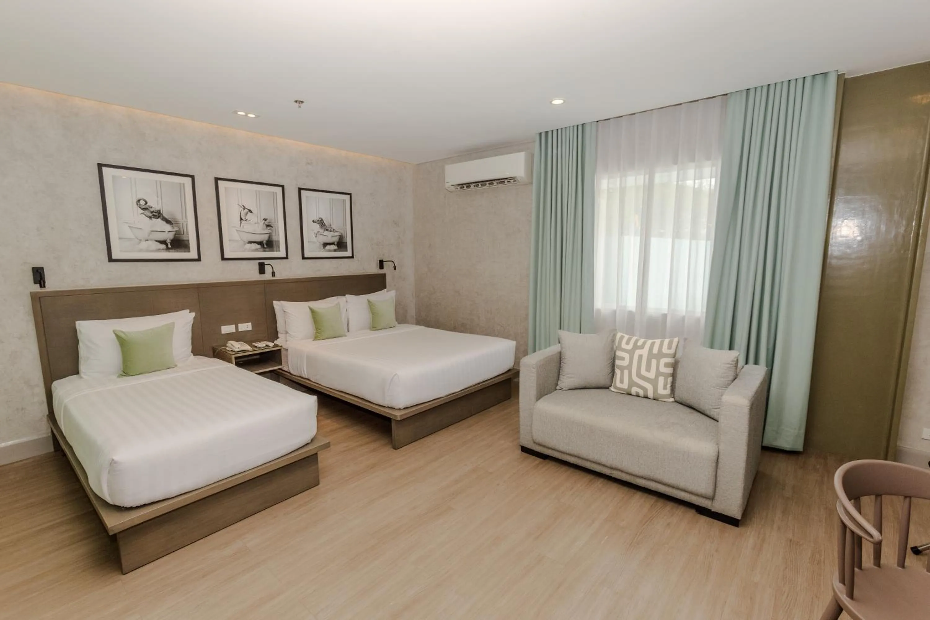 Seating area, Bed in Primeway Suites Cebu