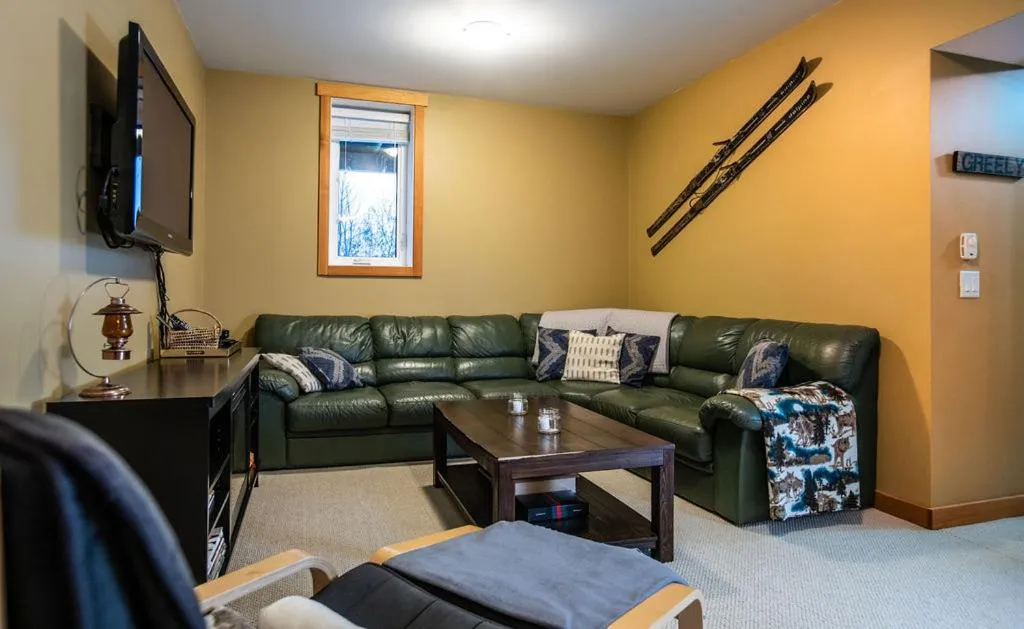 Living room in Stoke Cabin by Revelstoke Vacations
