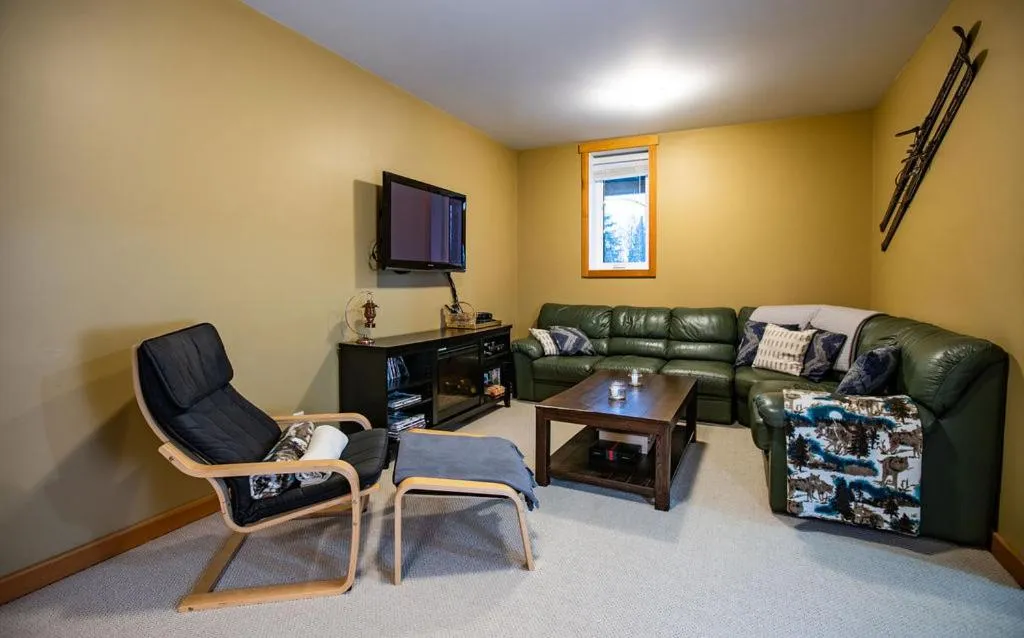 Living room in Stoke Cabin by Revelstoke Vacations
