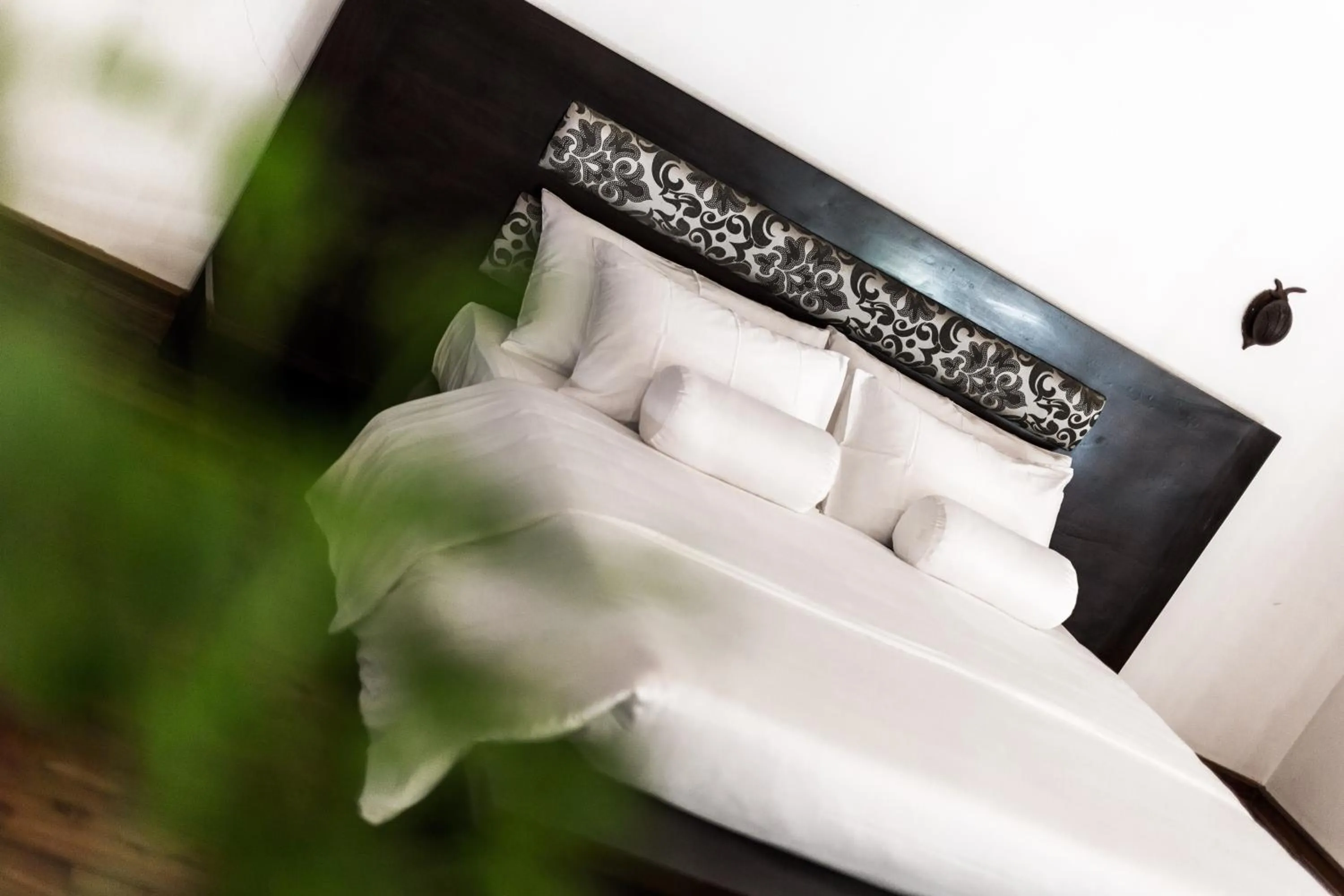 Bed in Villa White Queen Resort & Spa