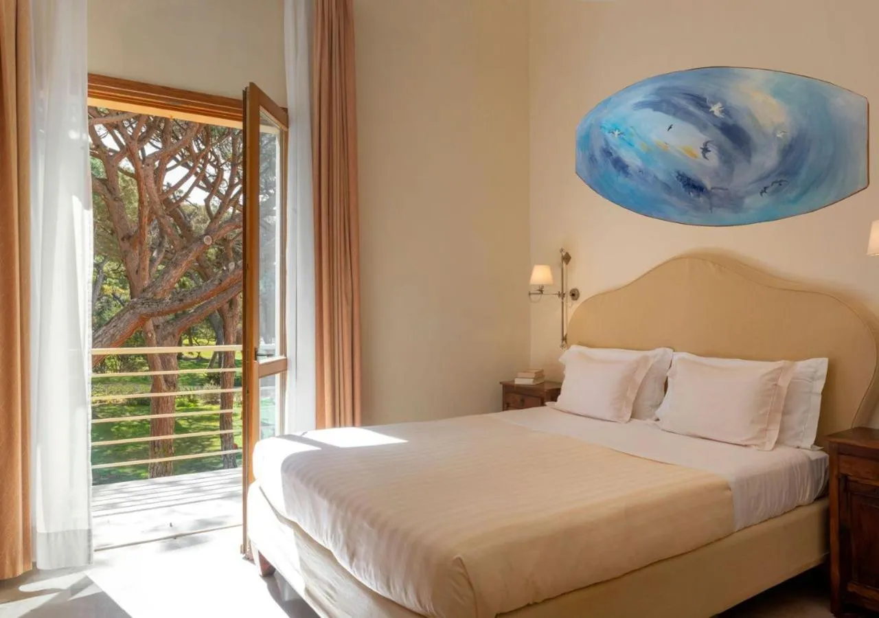 Bed in Tombolo Talasso Resort