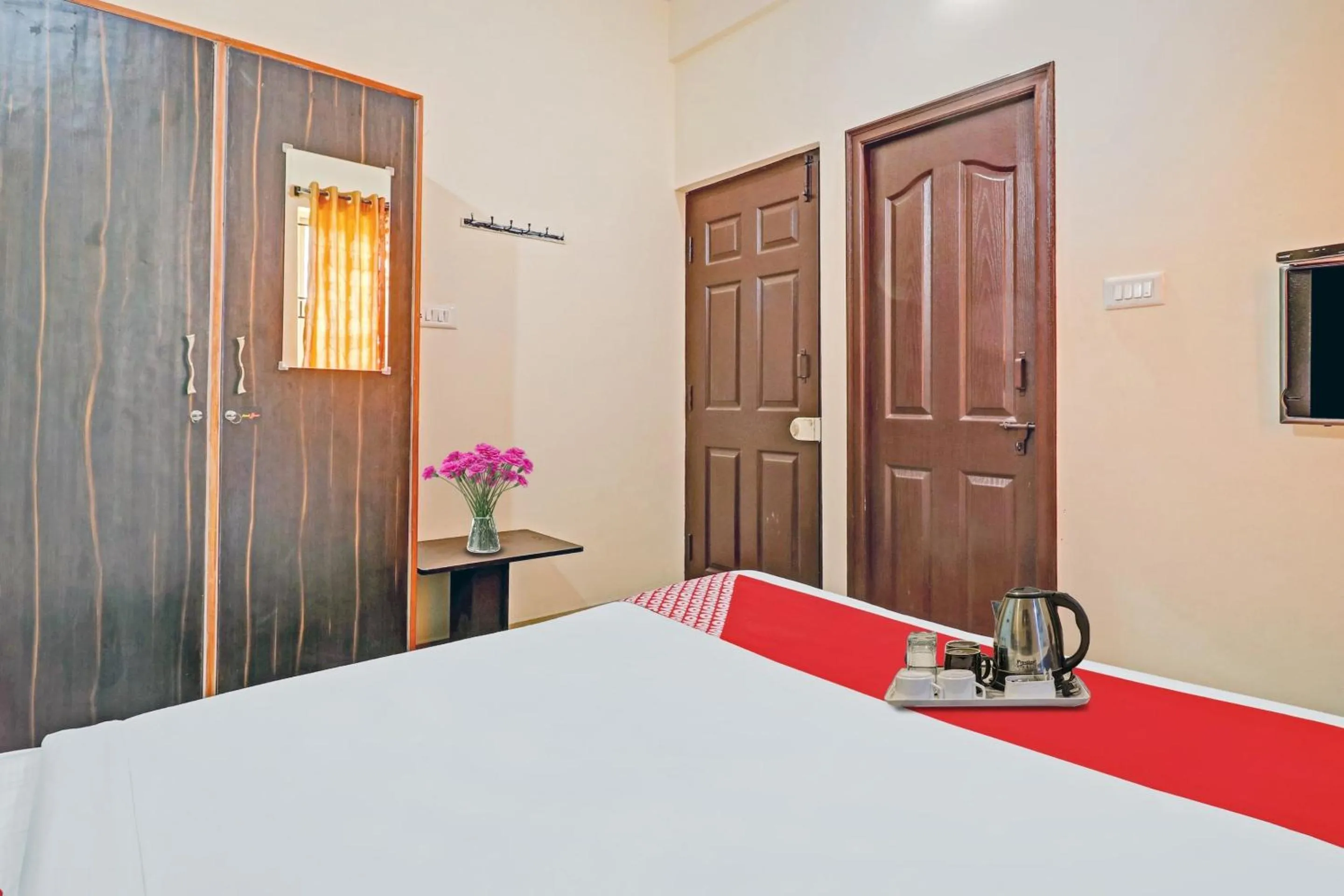 Bedroom, Bed in Super Hotel O Mn Residency Near Ragigudda Sri Prasanna Anjaneyaswamy Temple