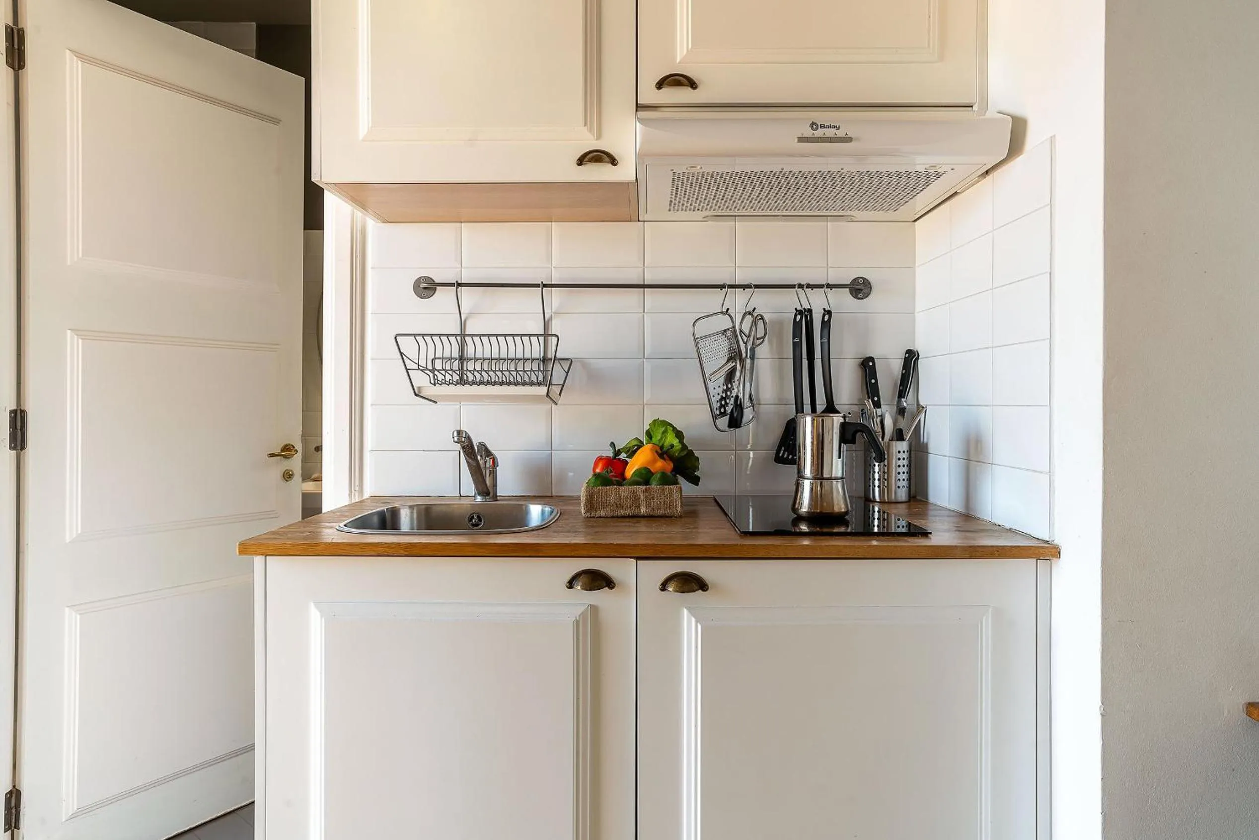 Kitchen or kitchenette in Casa Gracia Apartments