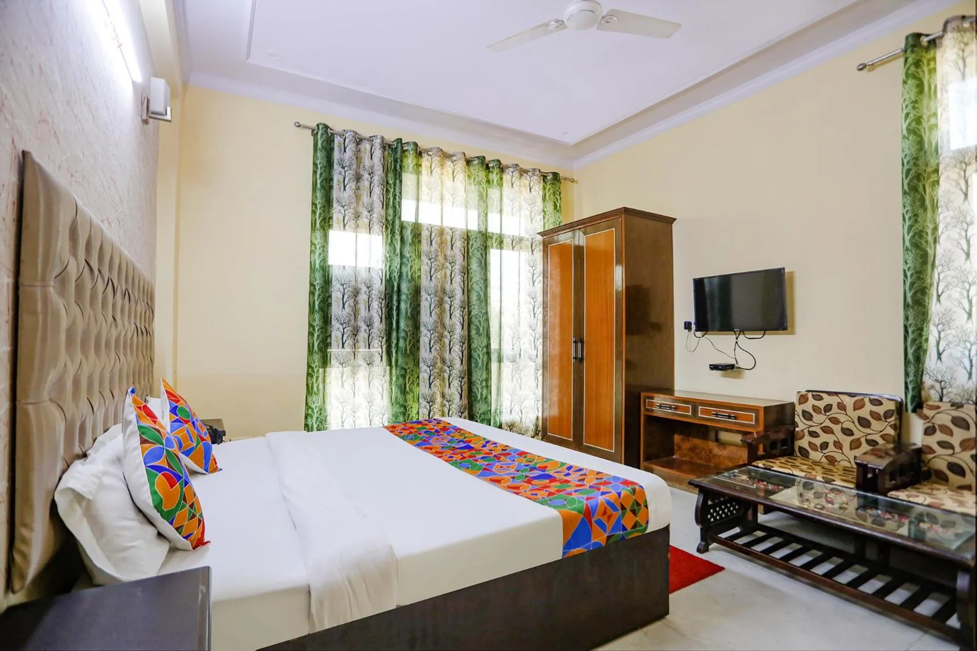 Bed in FabHotel HM Palace