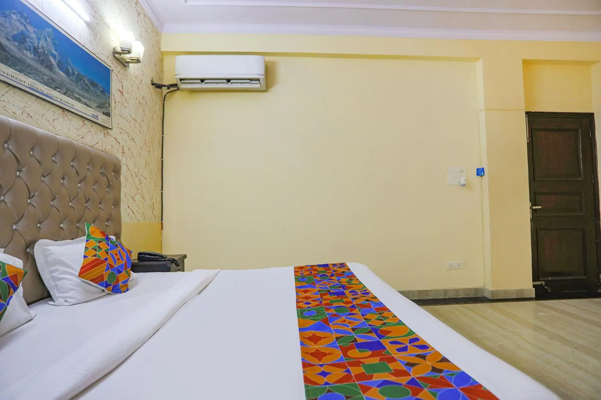 Bed in FabHotel HM Palace