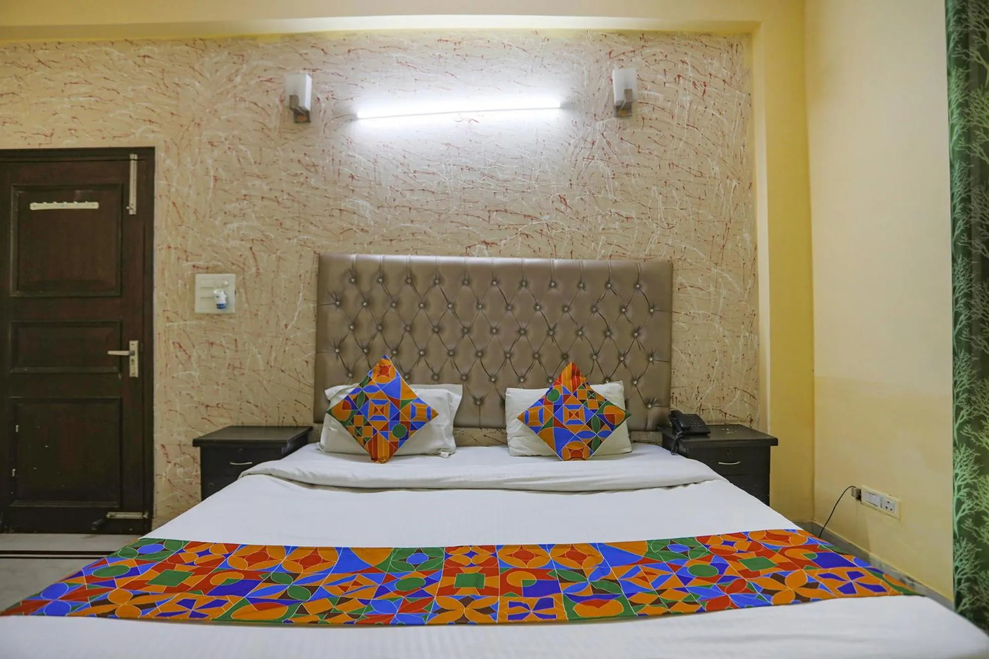 Bed in FabHotel HM Palace