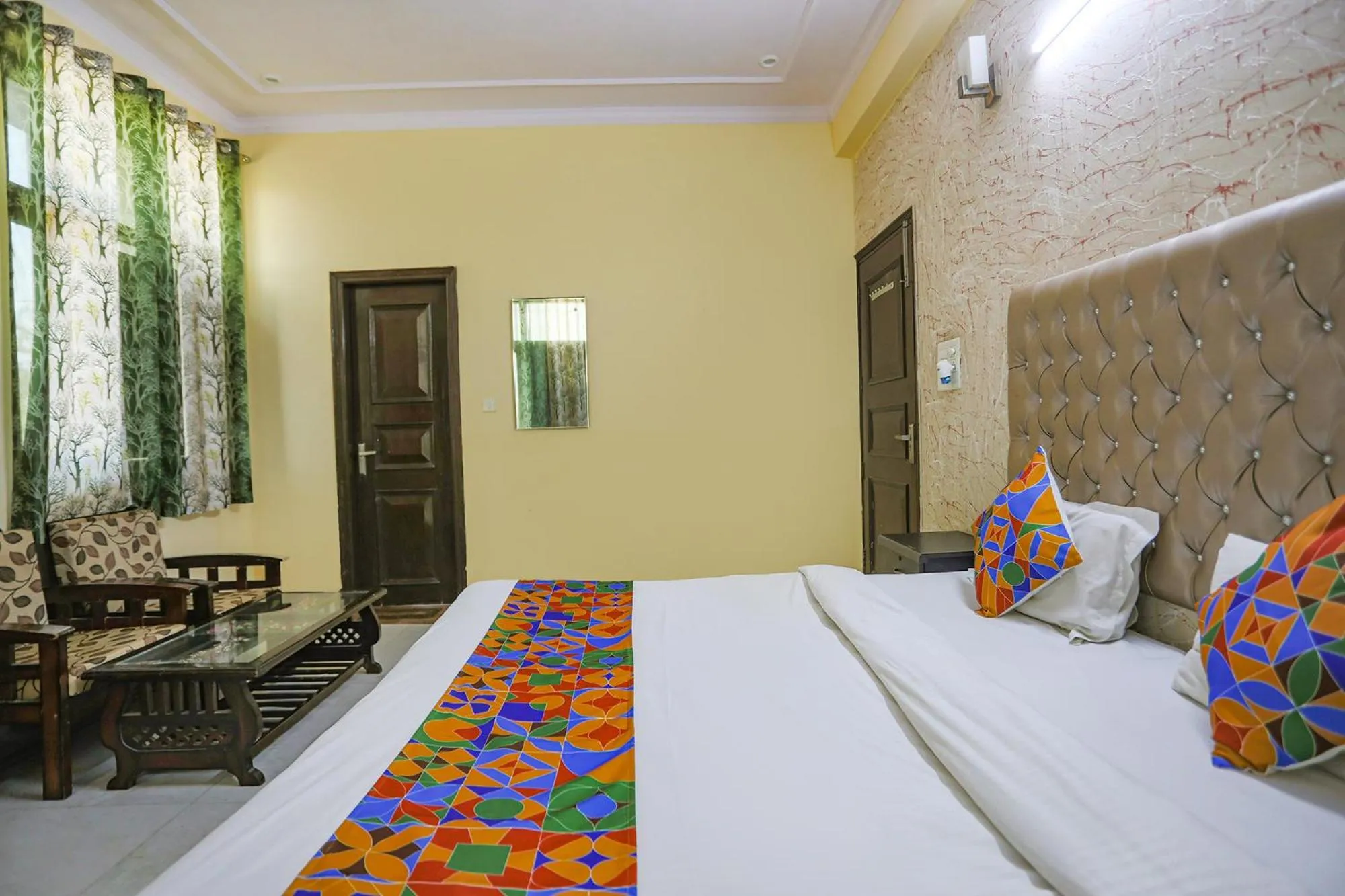 Bed in FabHotel HM Palace