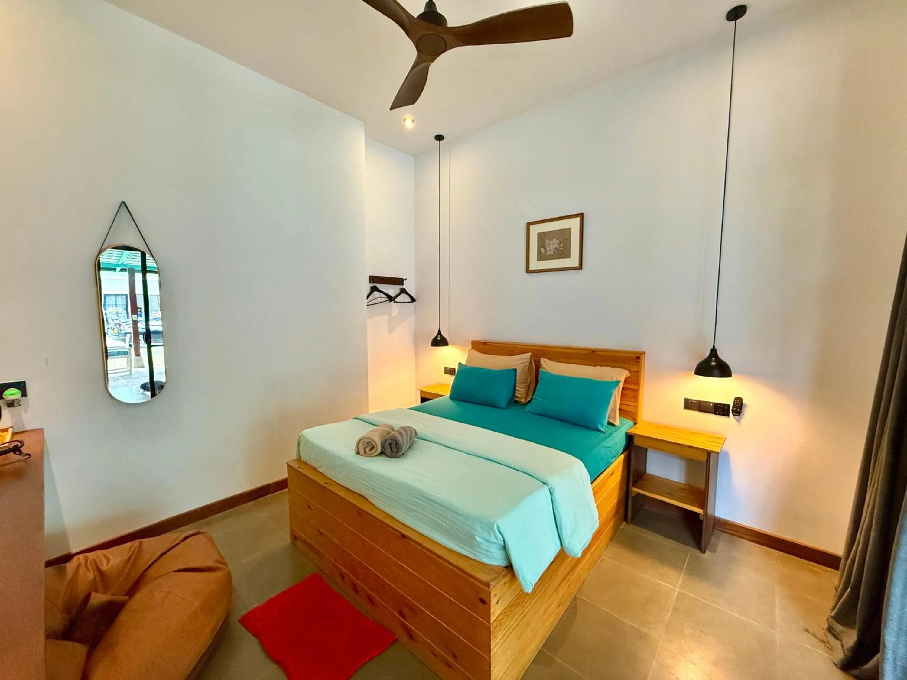 Bed in Ella Inn Hotel