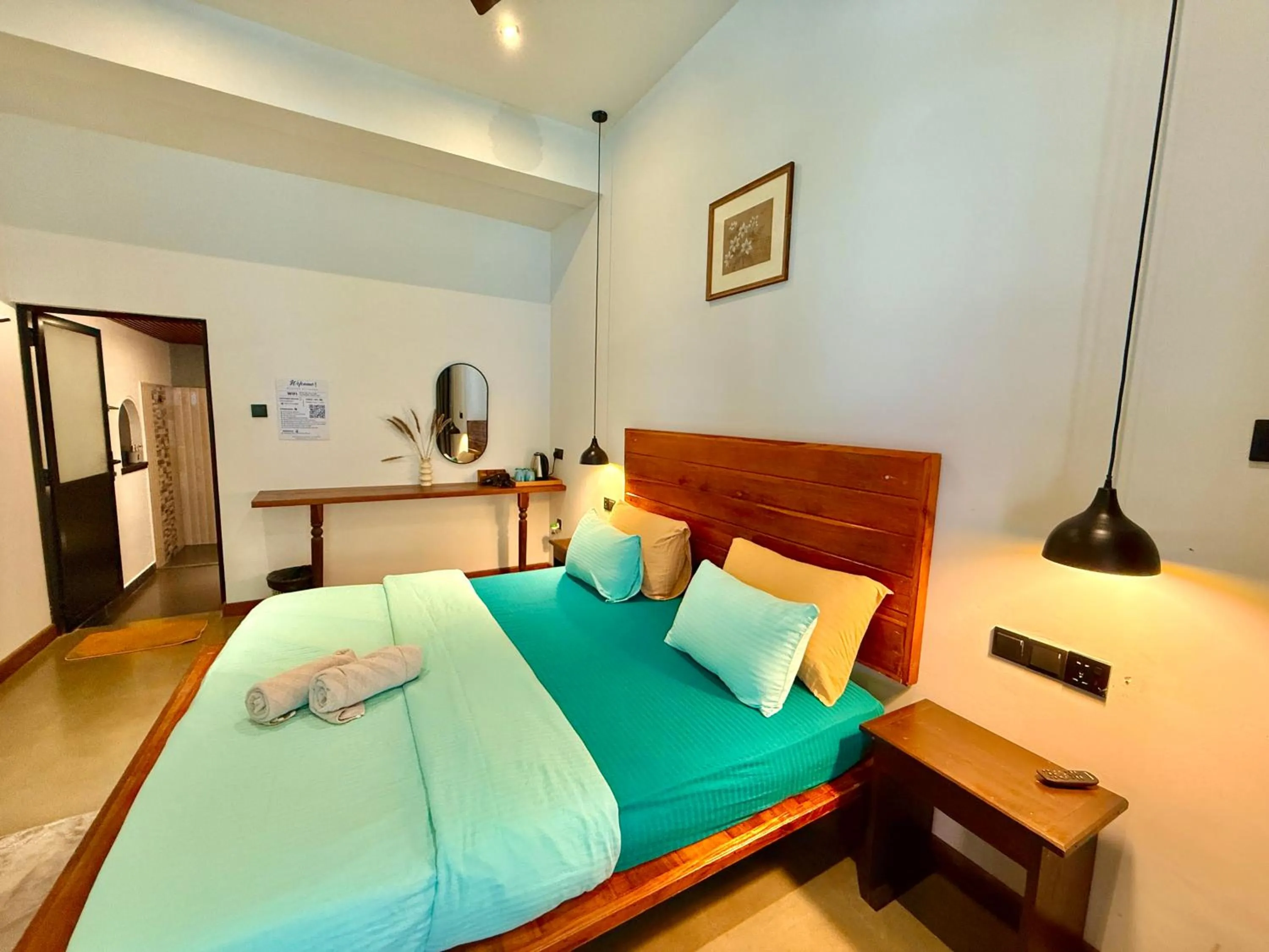 Bed in Ella Inn Hotel