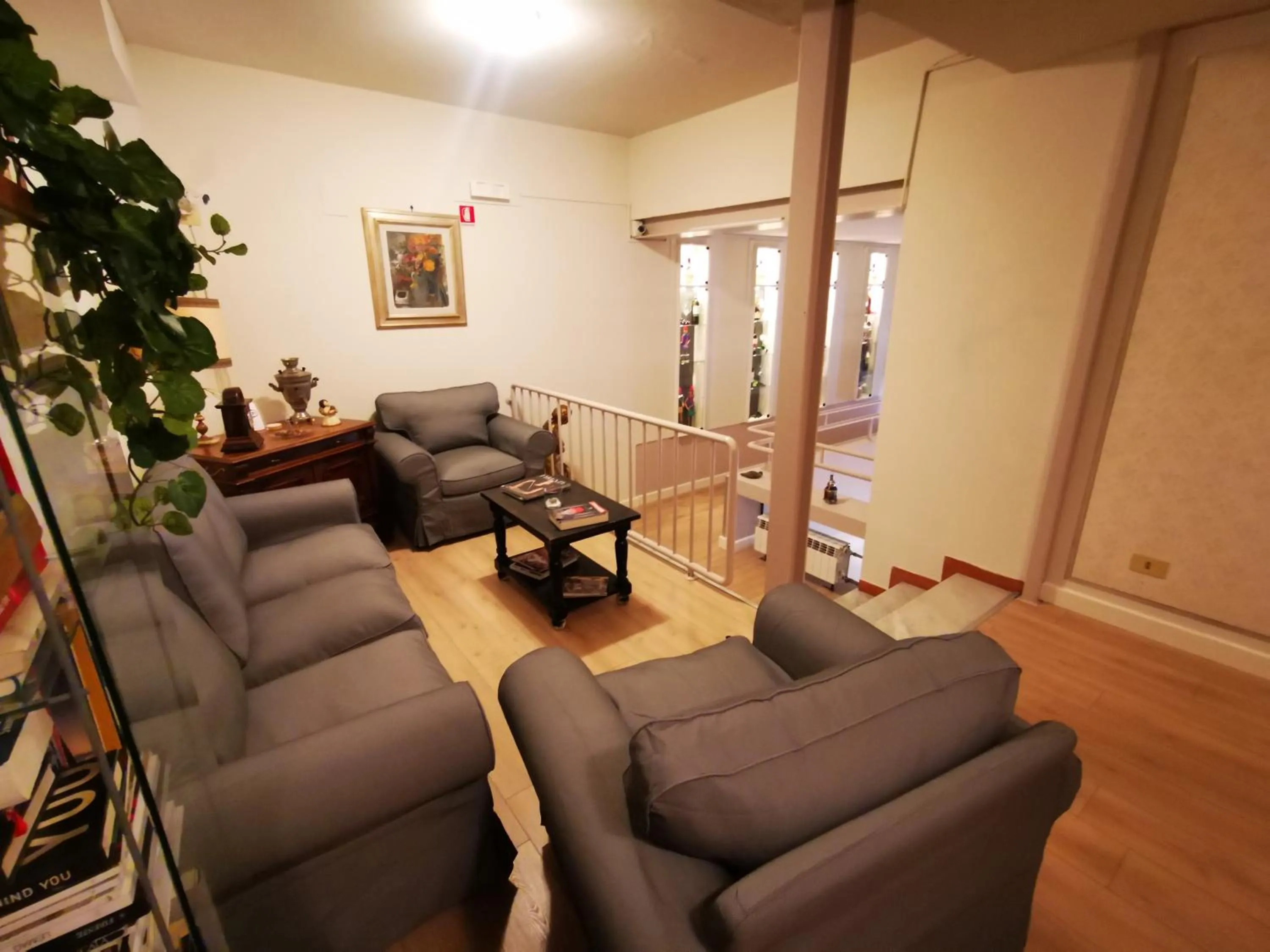 Communal lounge/ TV room in Hotel Balcony