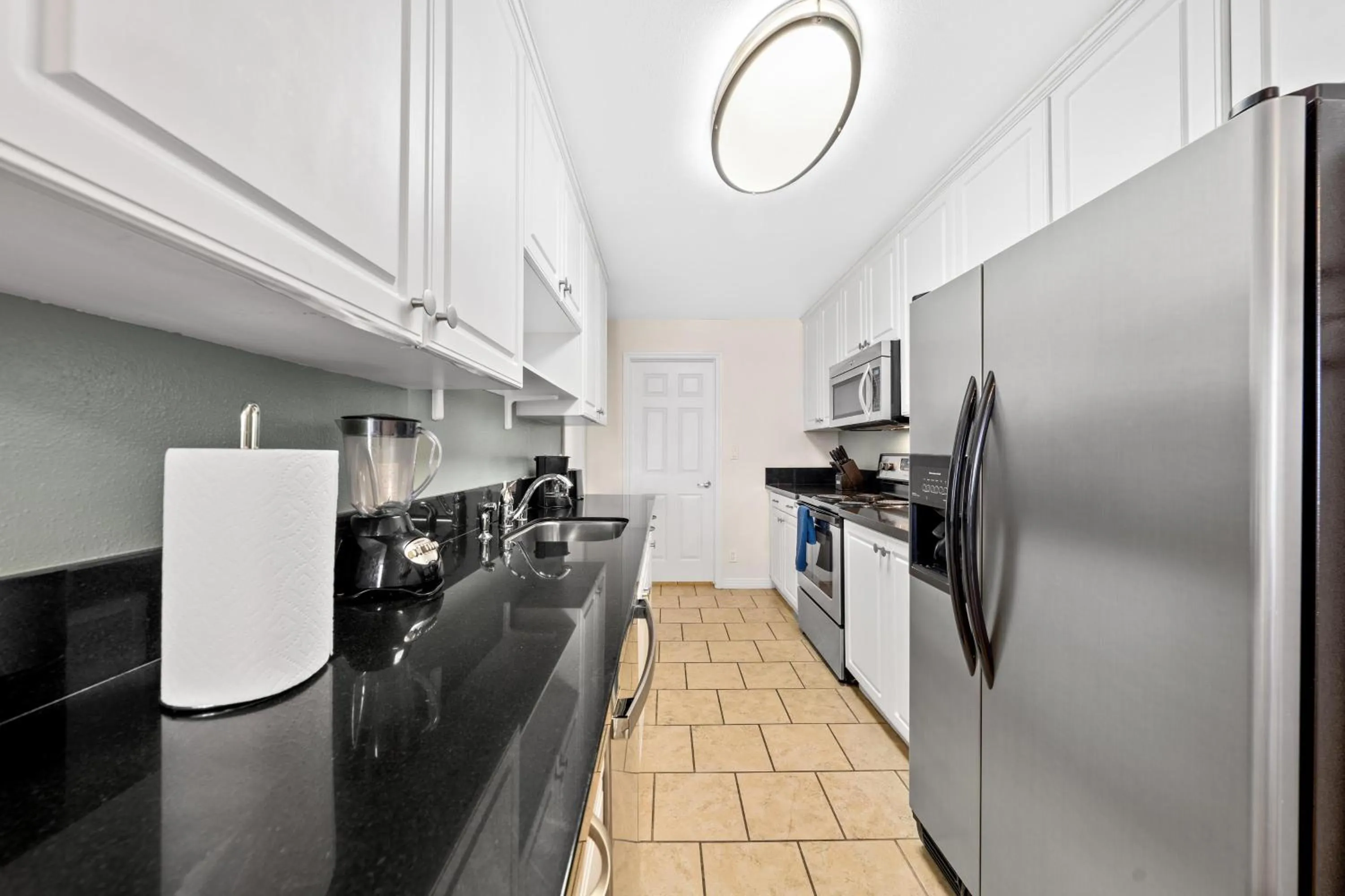 Kitchen or kitchenette in The tulip Marina Highrise with ocean view