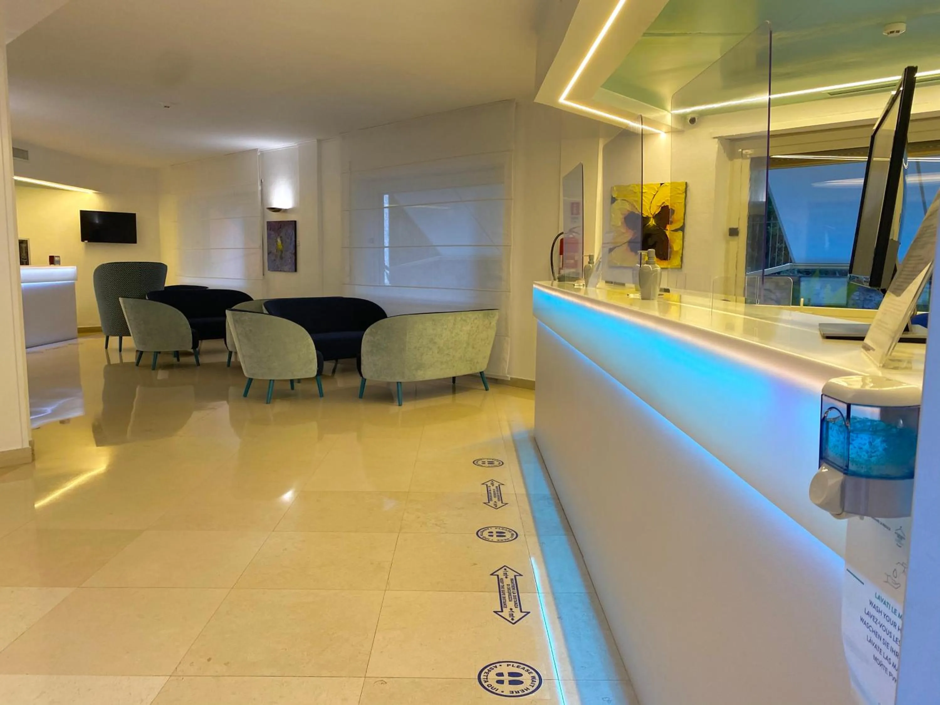 Lobby or reception in Hotel La Meridiana