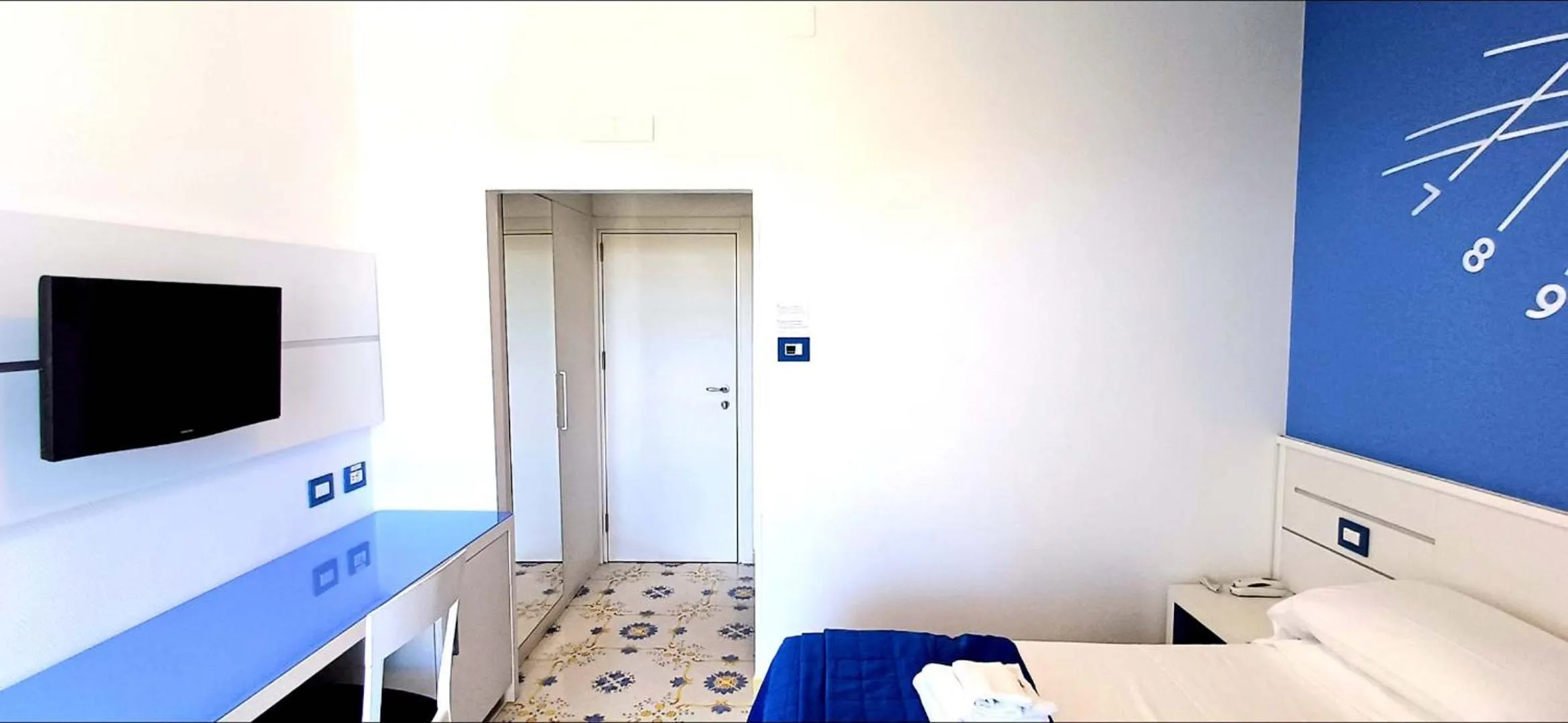 Bedroom in Hotel La Meridiana