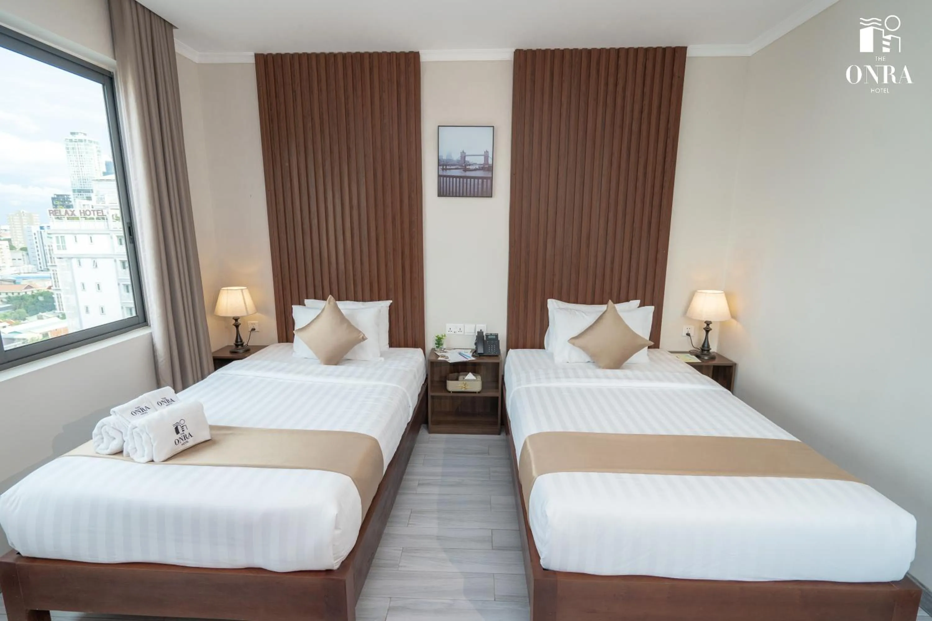 Bed in The ONRA Hotel