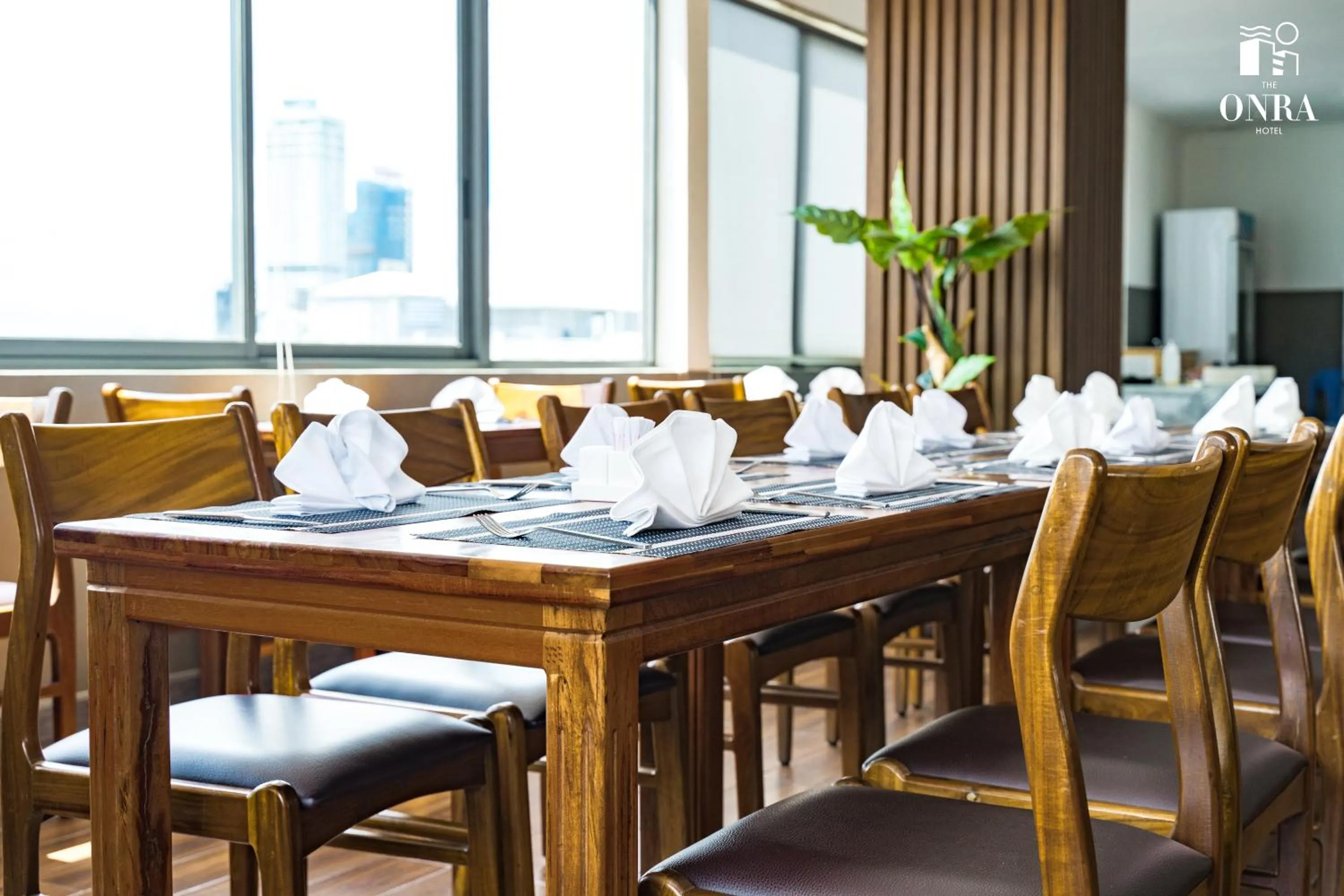 Dining area in The ONRA Hotel