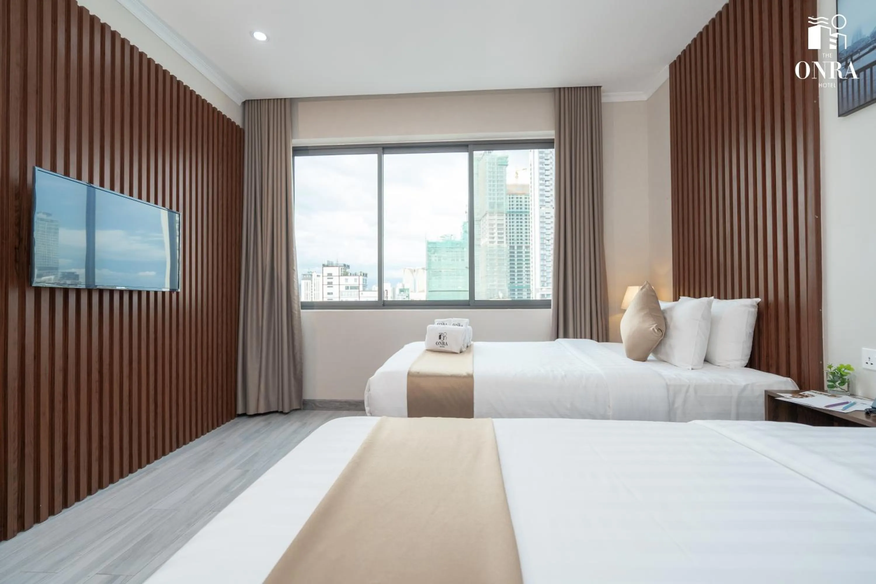 Bed in The ONRA Hotel