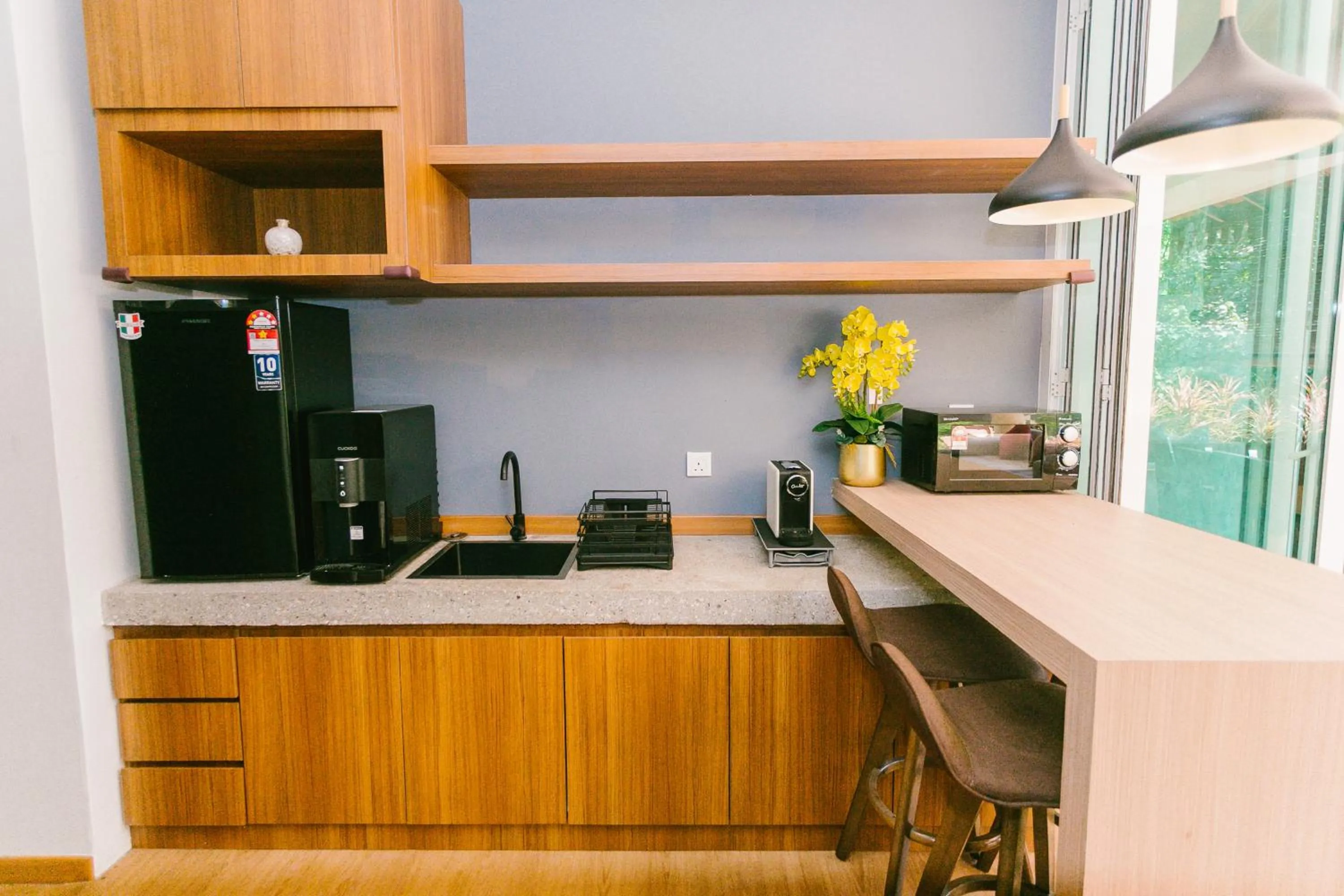 Kitchen or kitchenette in Royale Riviera Resort Private Pool Villas