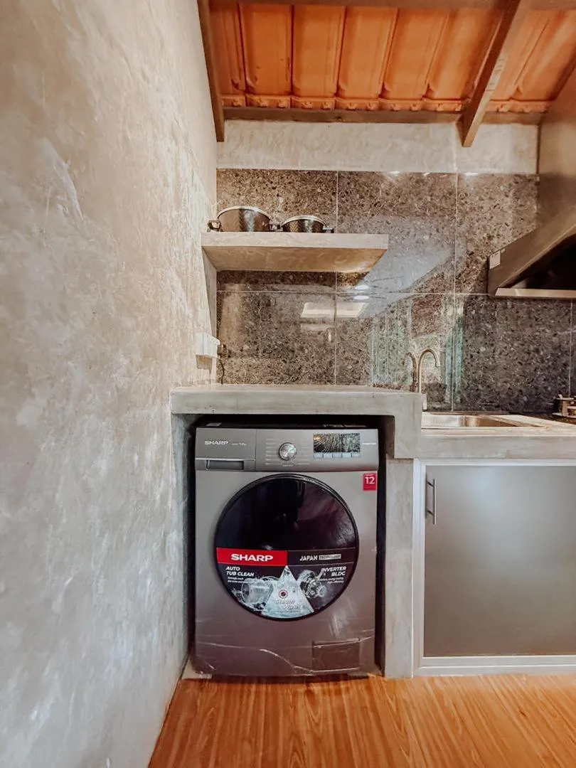 washing machine in Royale Riviera Resort Private Pool Villas