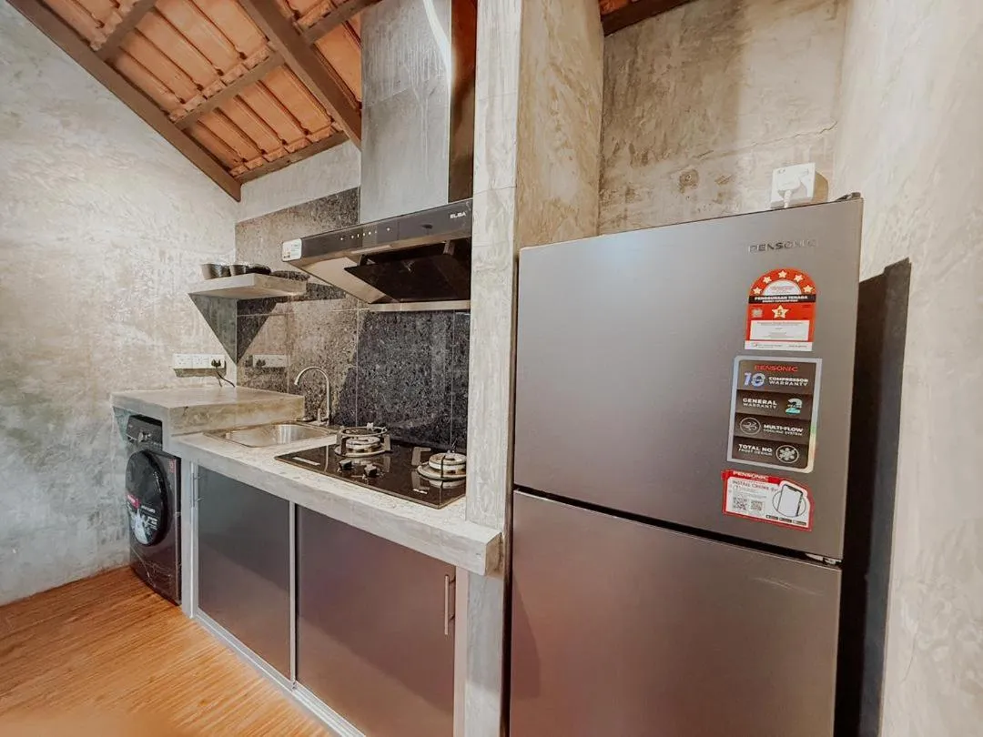 Kitchen or kitchenette in Royale Riviera Resort Private Pool Villas