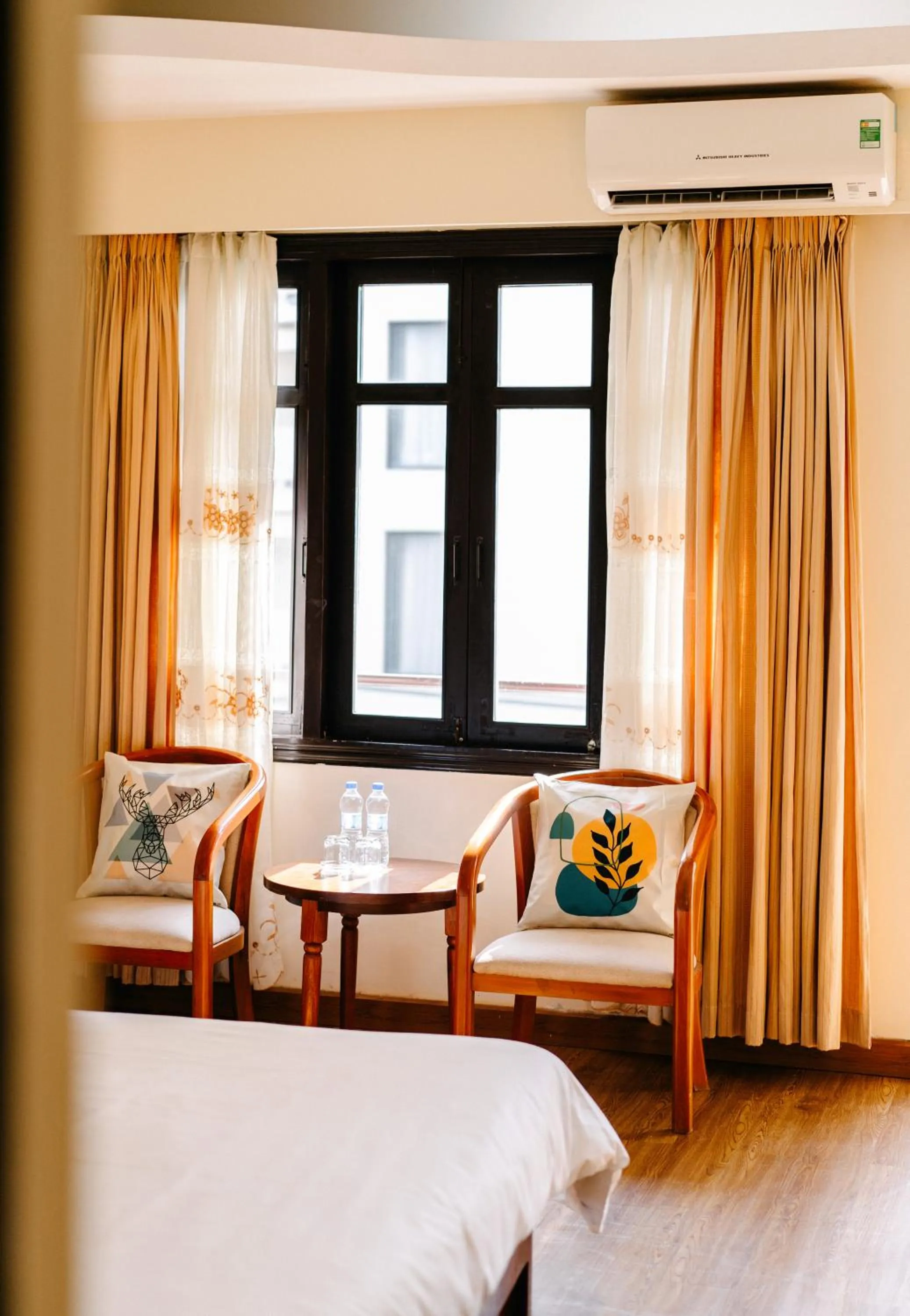 Seating area, Bed in Mercury Hotel & Apartment