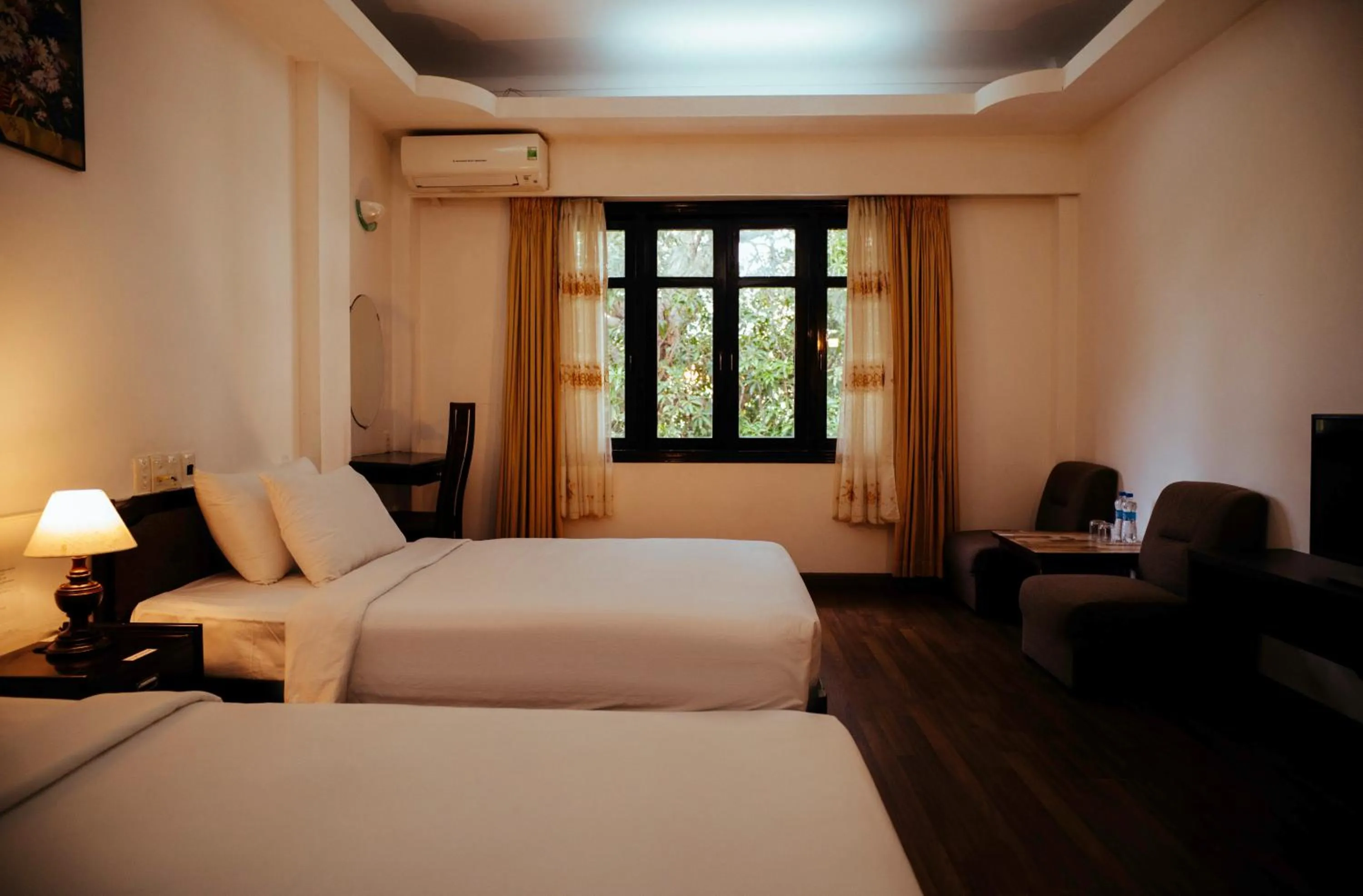 Bed in Mercury Hotel & Apartment