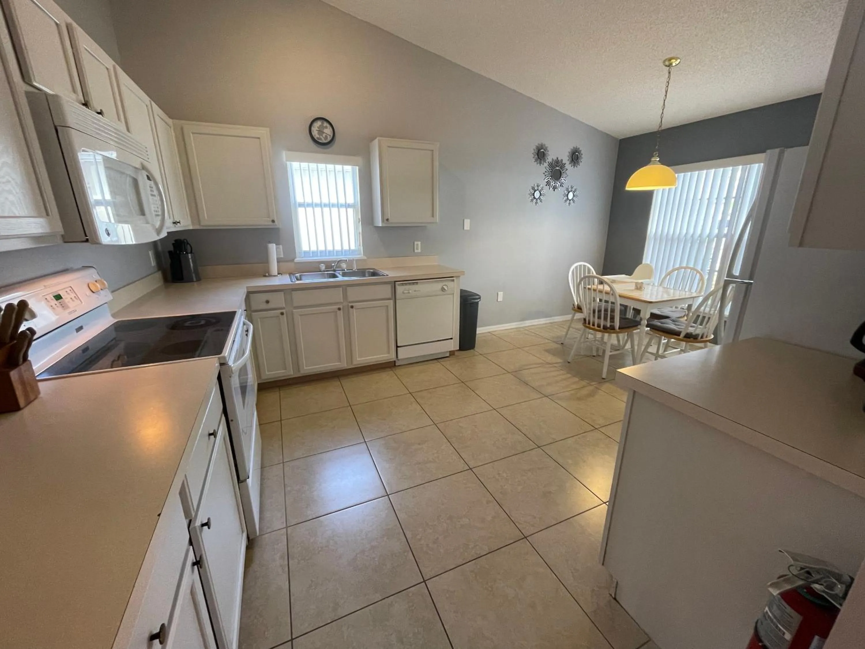 Kitchen or kitchenette in 3 Bedroom Villa with Poolside Cinema and Games Room Close to theme Parks sleeps 6 plus 2