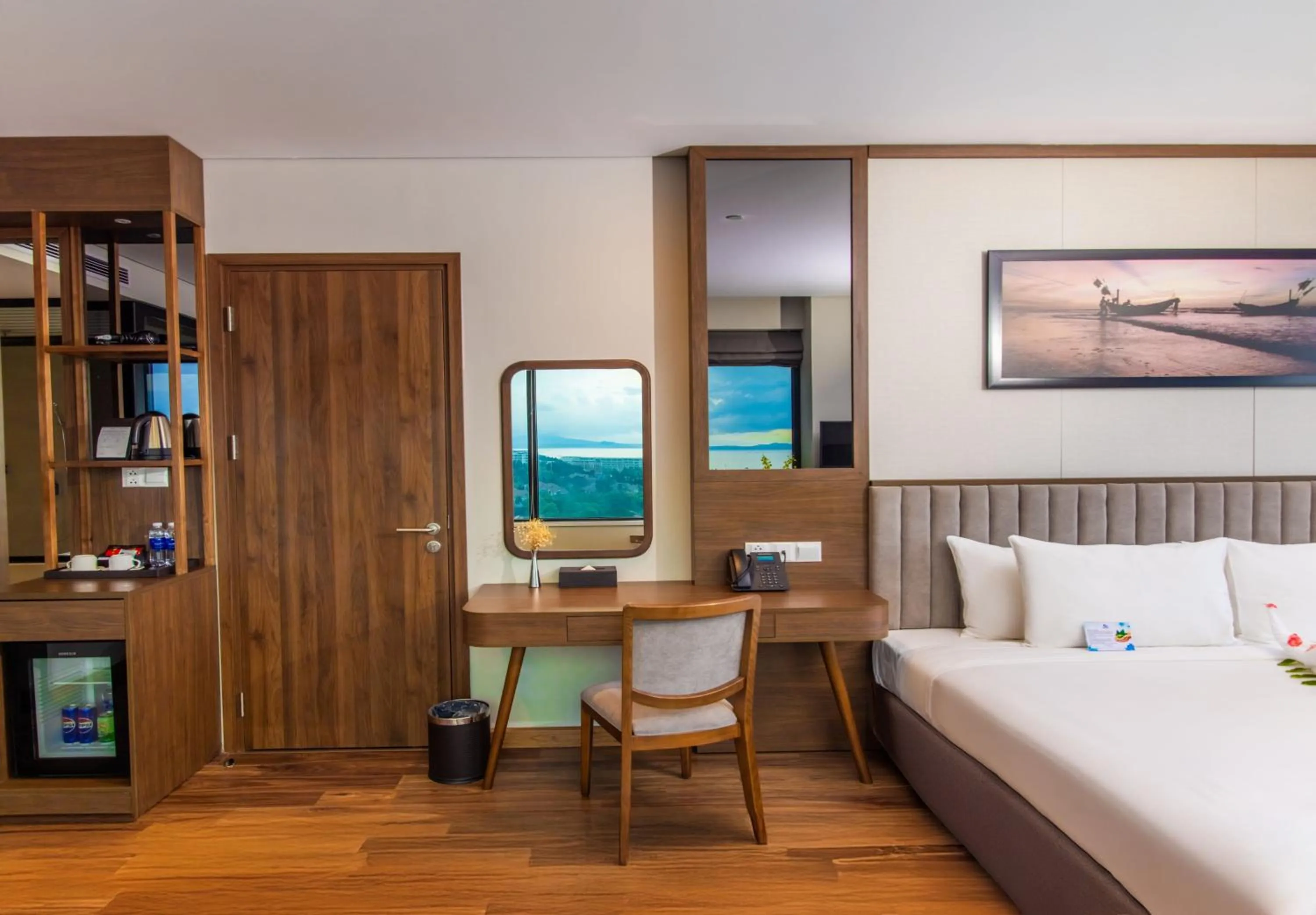 Seating area, Bed in Vipol Mui Ne Hotel & Spa