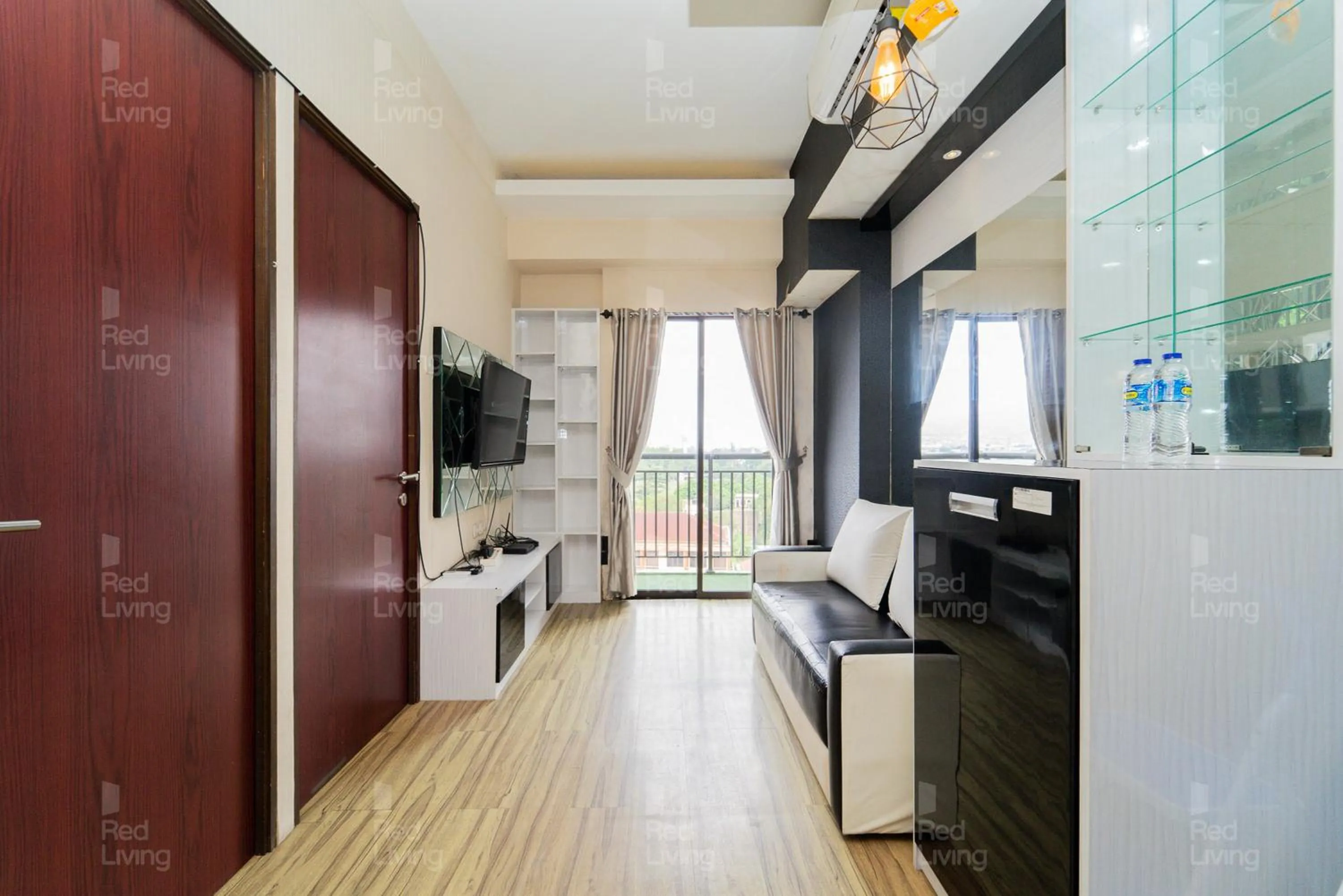 TV and multimedia in RedLiving Apartemen Tamansari Panoramic - Santuy Agency