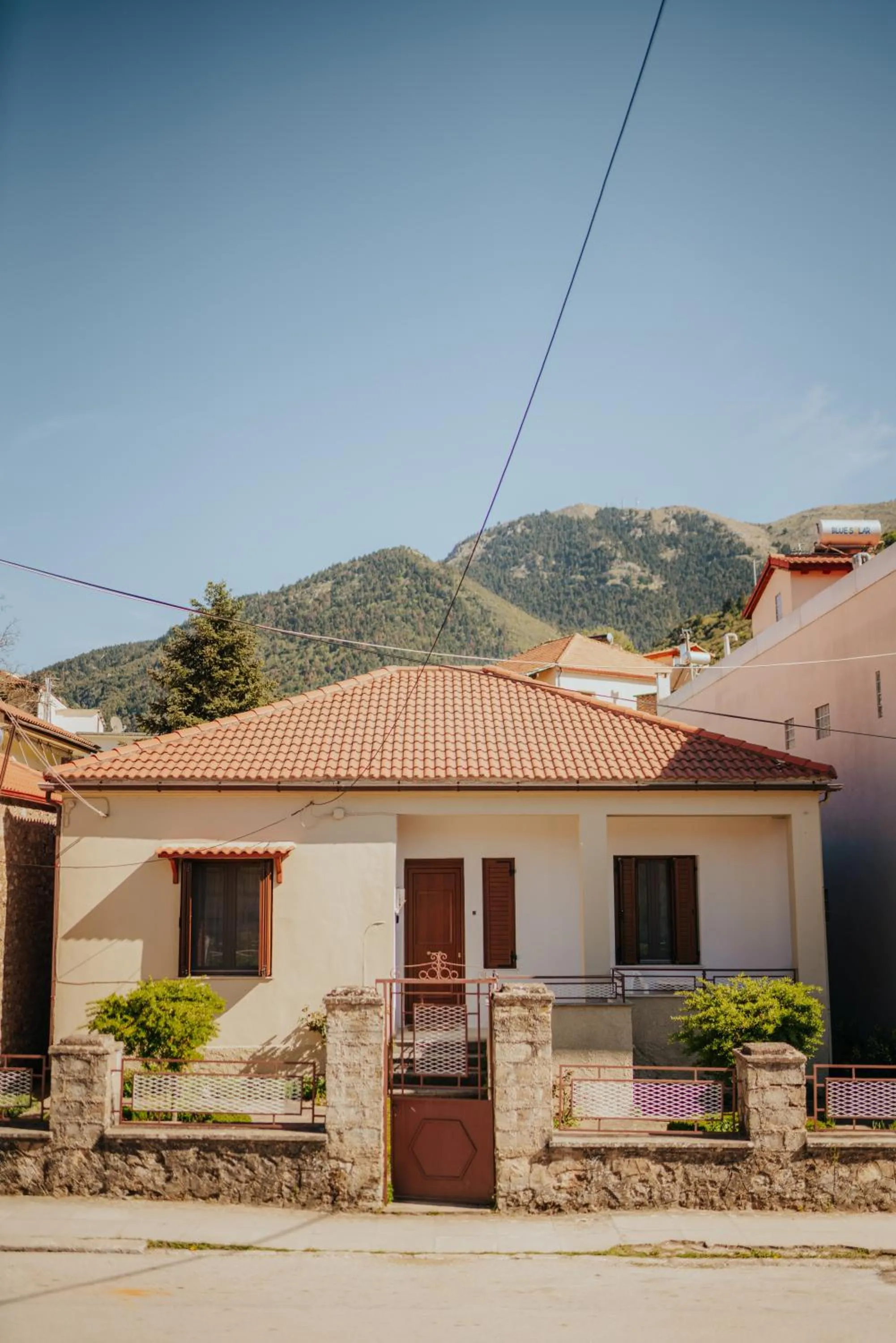 Facade/entrance in Kalavrita downtown 3 bedrm house for 6 pers by MPS