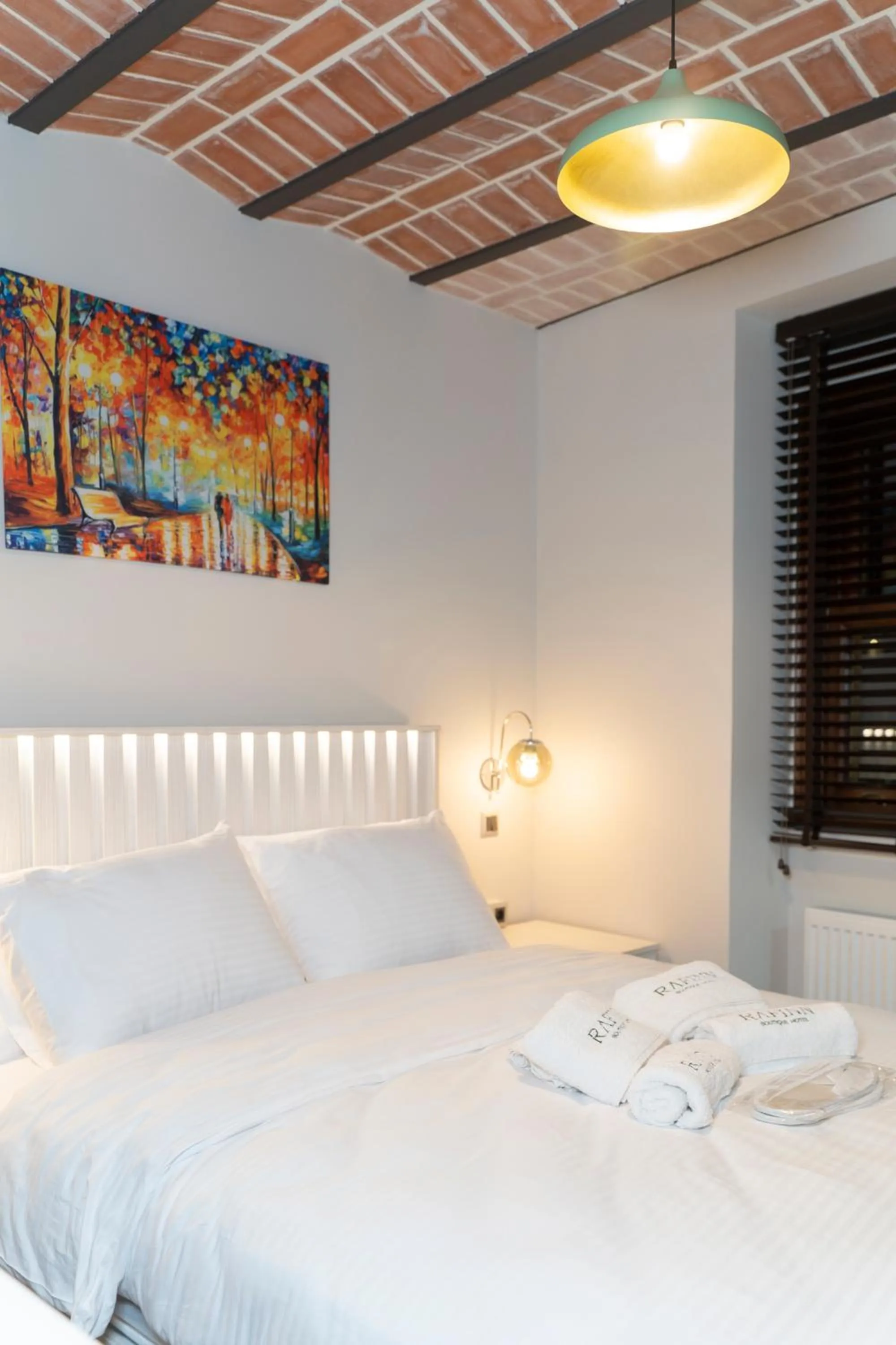 Bedroom in Rafinn Hotel