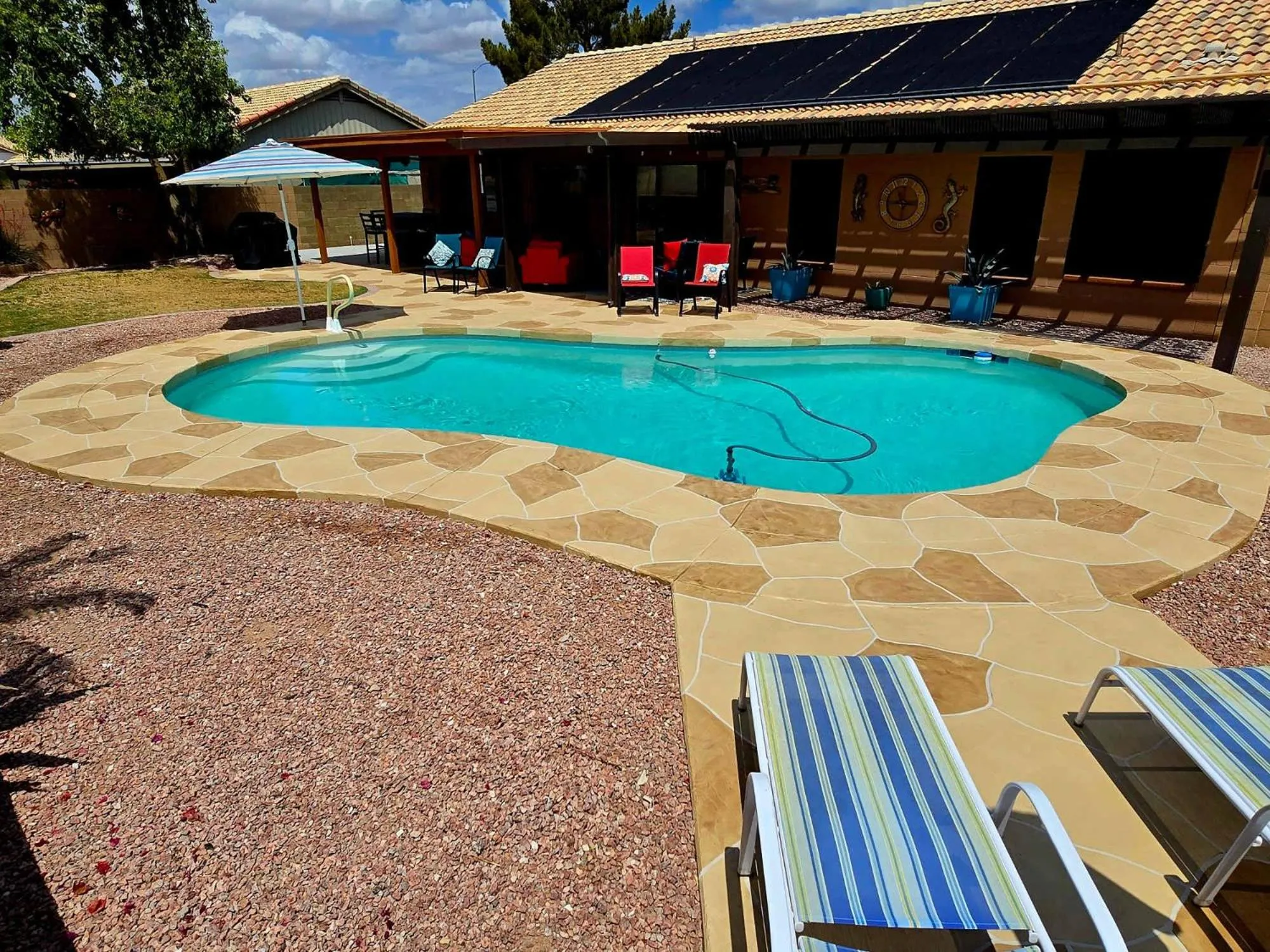 Cozy home with pool, fire table, BBQ, RV parking