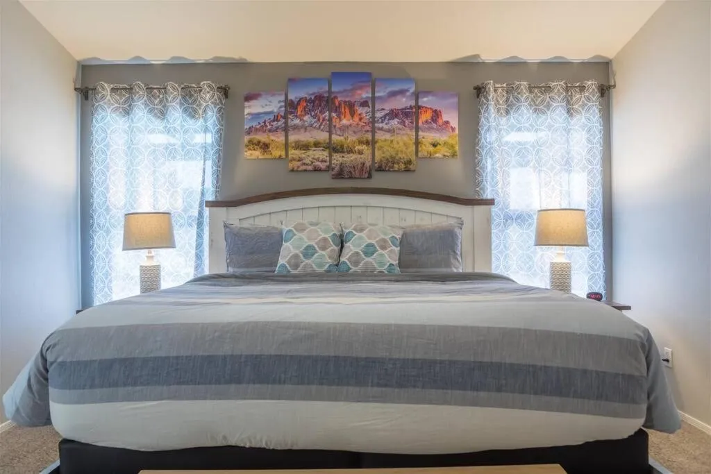 Bed in Cozy home with pool, fire table, BBQ, RV parking