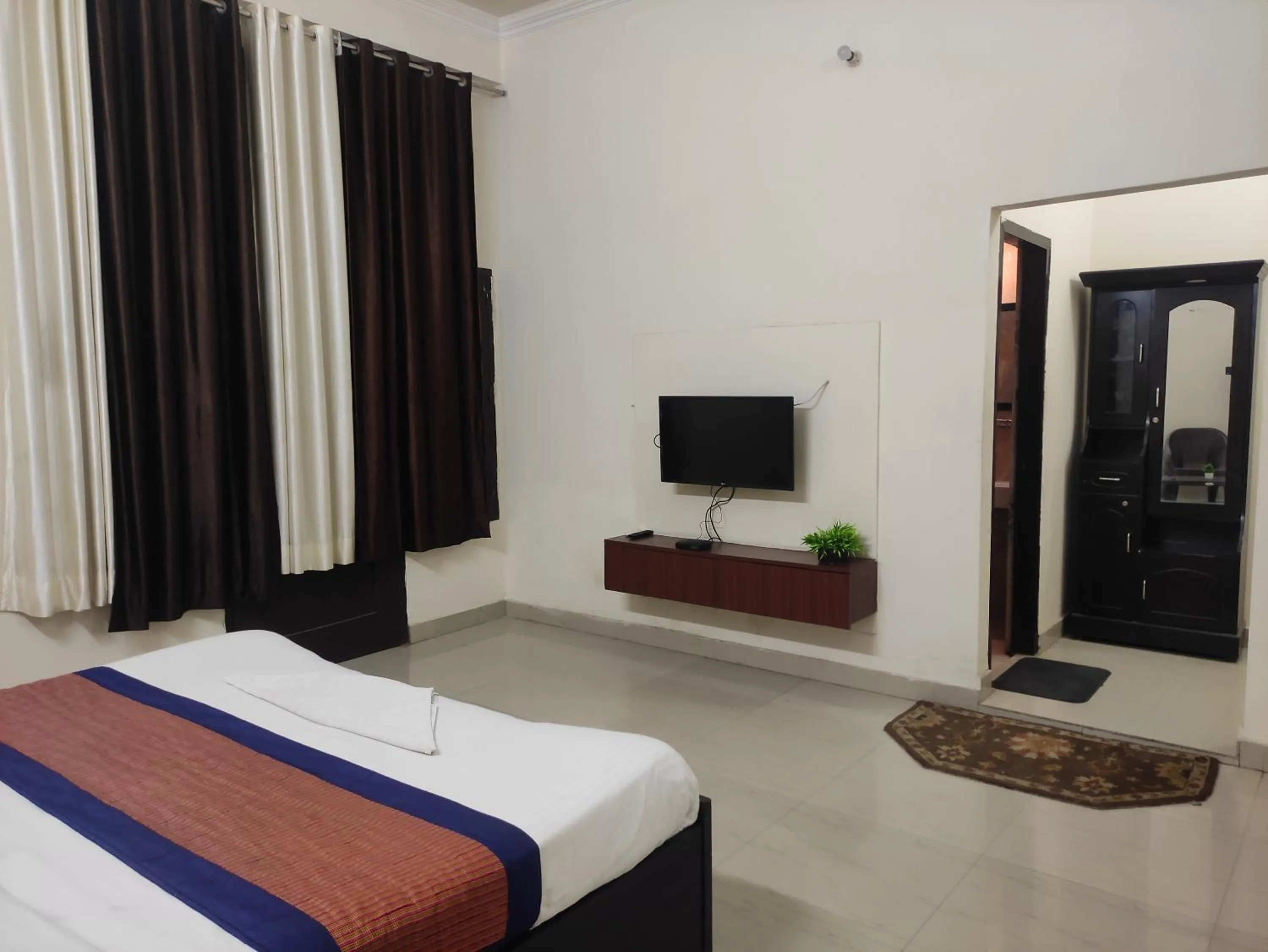 Bed in IIDM Eco Resort