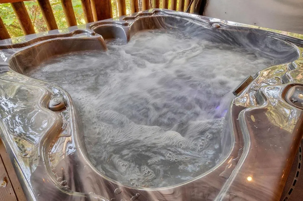 Gorgeous Idyllic Cabin w Hot Tub and Fire Pit Quittin Time is Secluded Romantic Oasis w Luxury Bathroom Double Shower and Bathtub Foosball Table