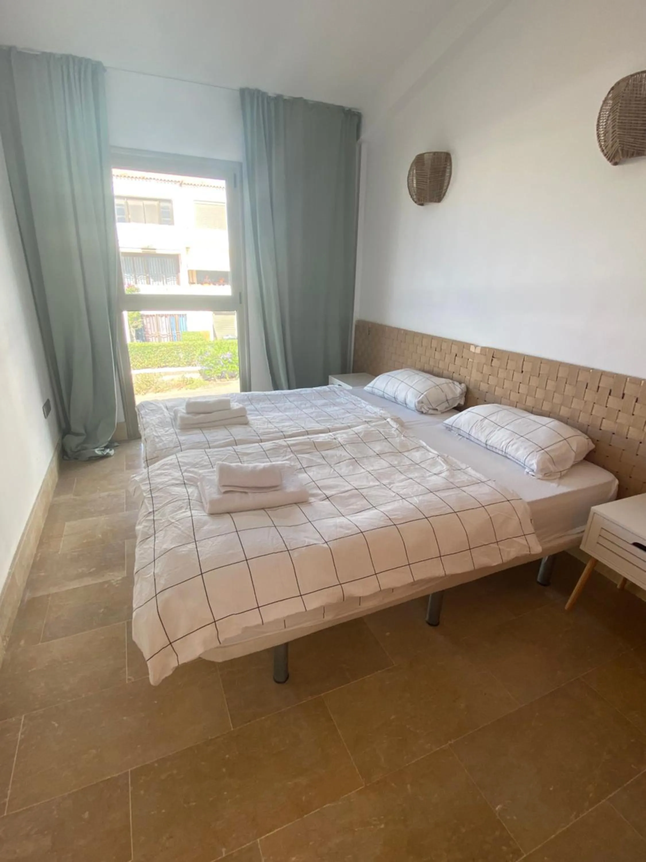 Bed in SUN BAY VILLAS APARTMENT