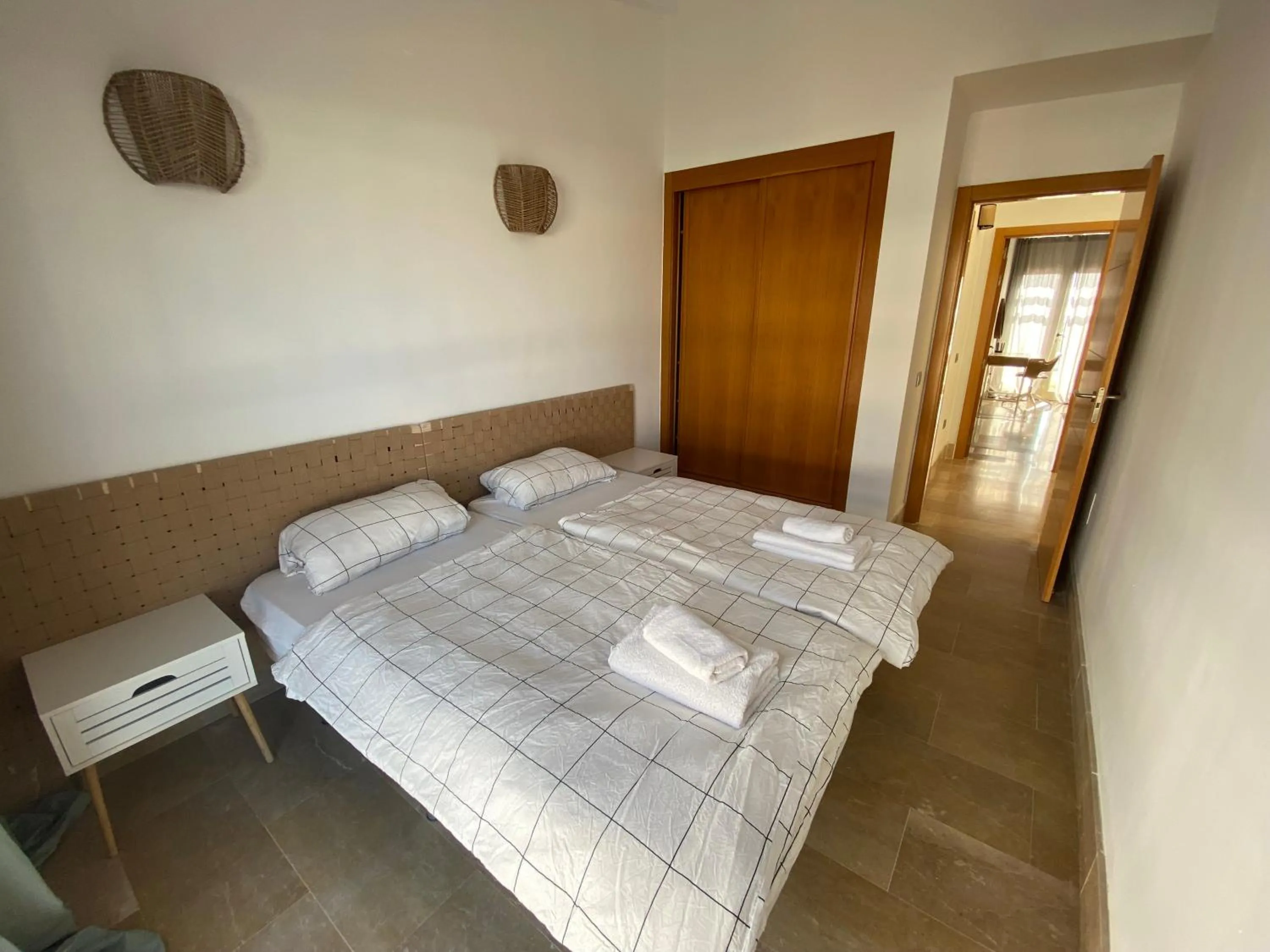 Bed in SUN BAY VILLAS APARTMENT