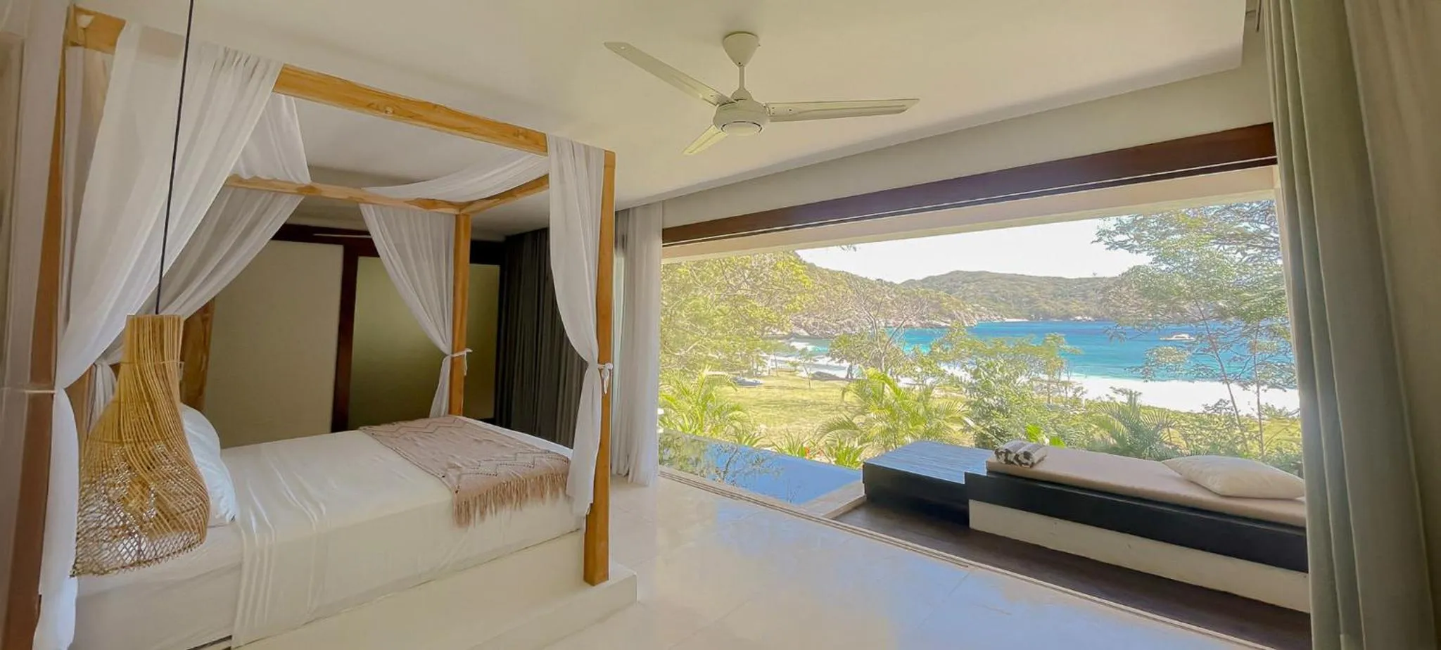 Bed in Kirana Retreat - Beach Front Resort