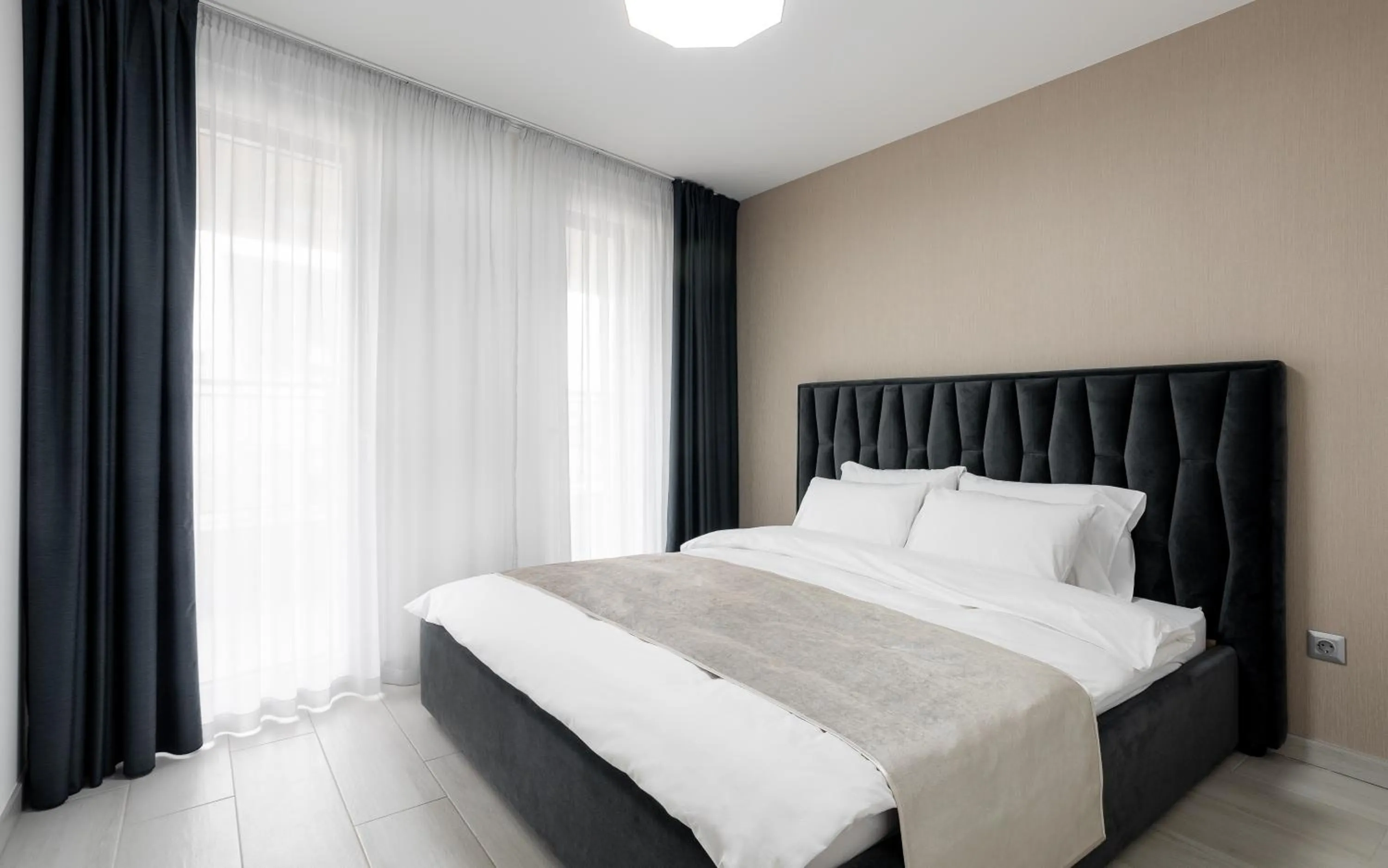 Bed in Avand Apartments Debrecen